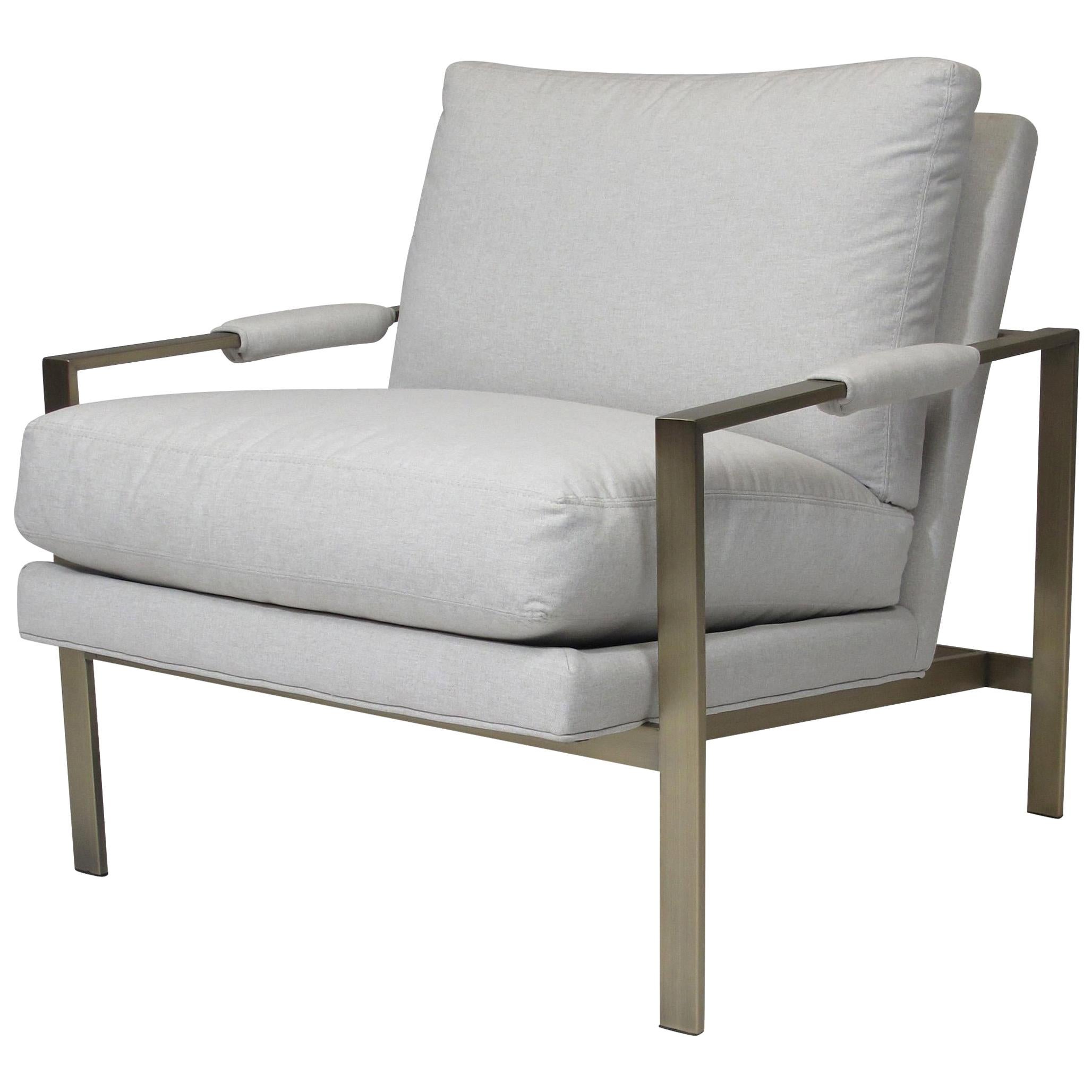 Classic Milo Baughman for Thayer Coggin lounge chairs in a brushed brass finish and off-white upholstered cushions.   Excellent condition. 


 