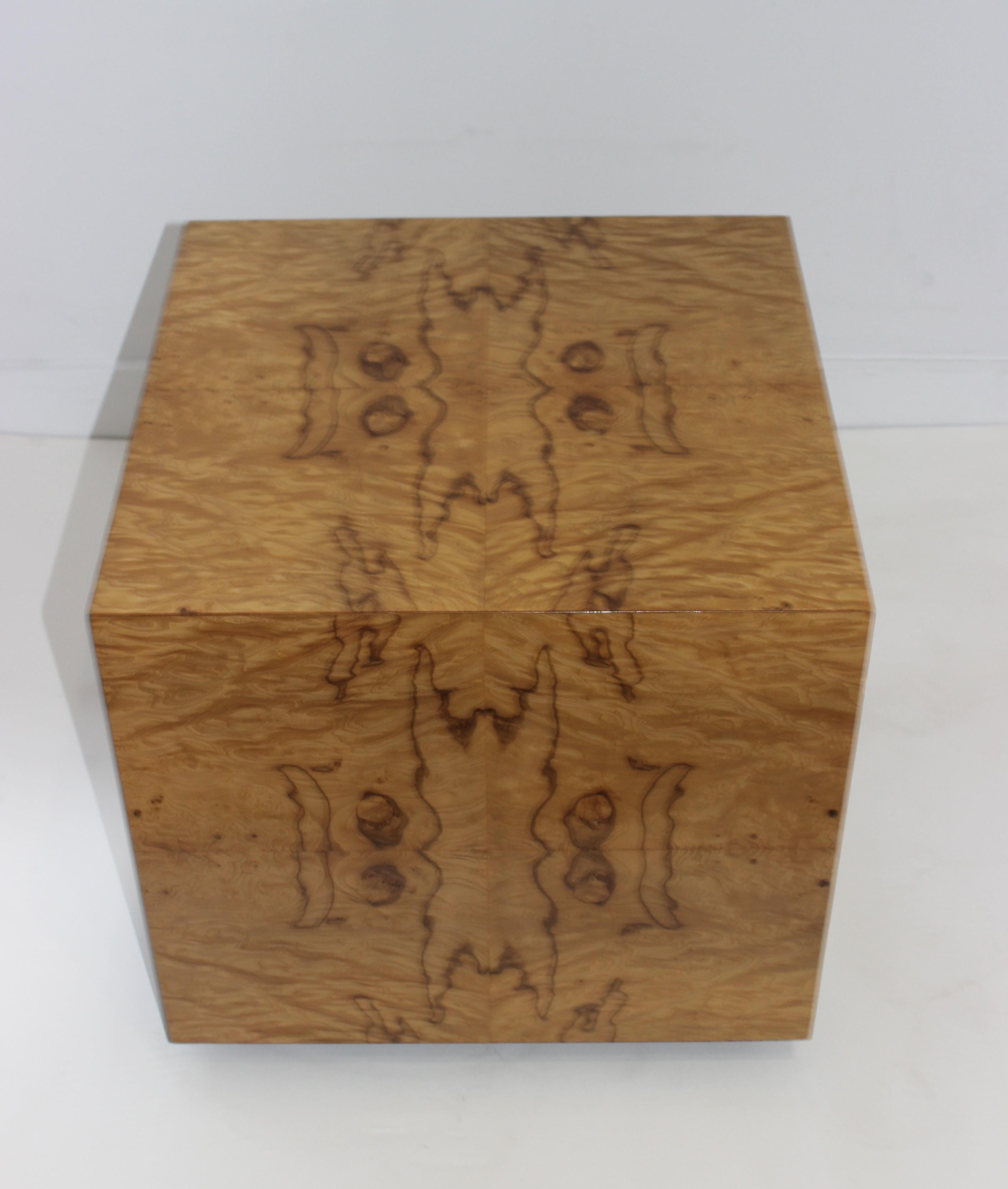 Milo Baughman burl olive wood cube side table from a palm beach estate. Sits on a low black inset stand.