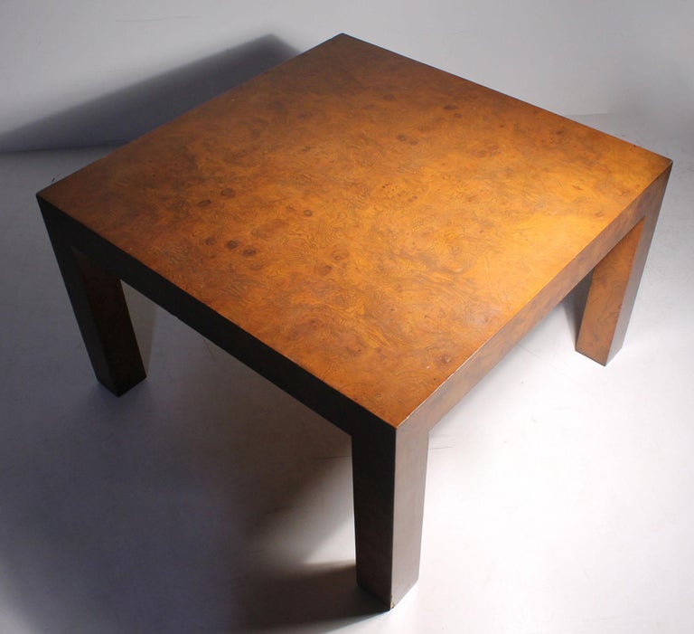 Attributed to Milo Baughman burl olivewood parsons style coffee table.
Dated on bottom 1978.