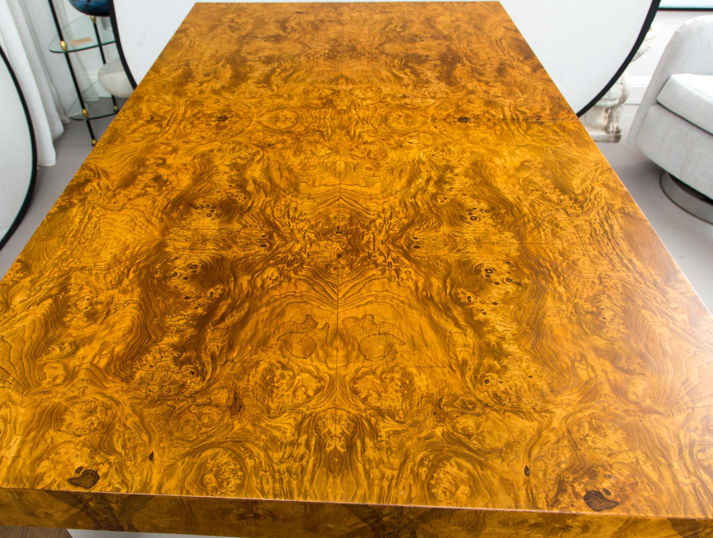 Burl wood table with two leaves, designed by Milo Baughman. Fully extended, table measures: 110 inches.