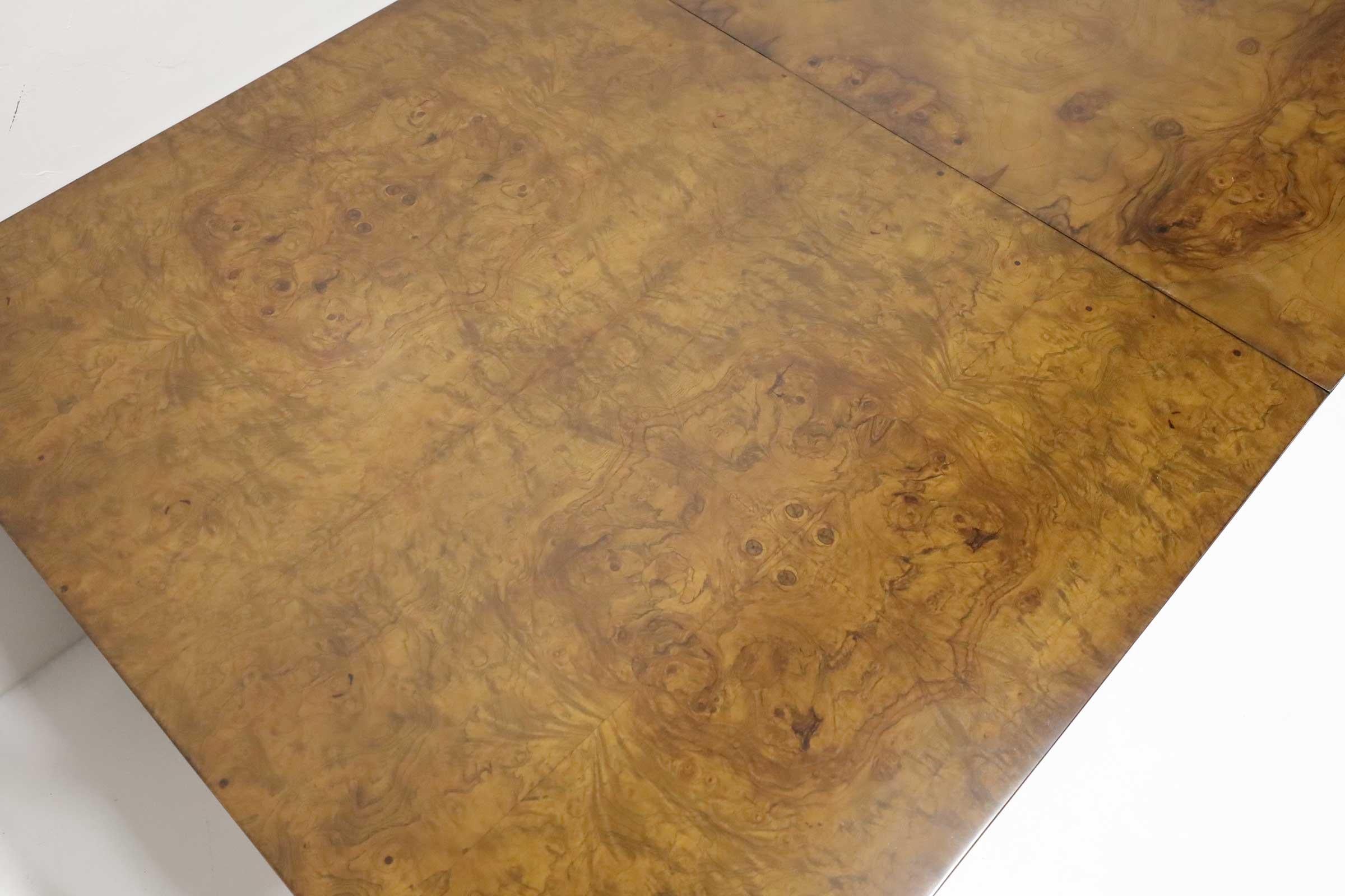 A classic by Milo Baughman. A burlwood parson style dining table. Table is 66