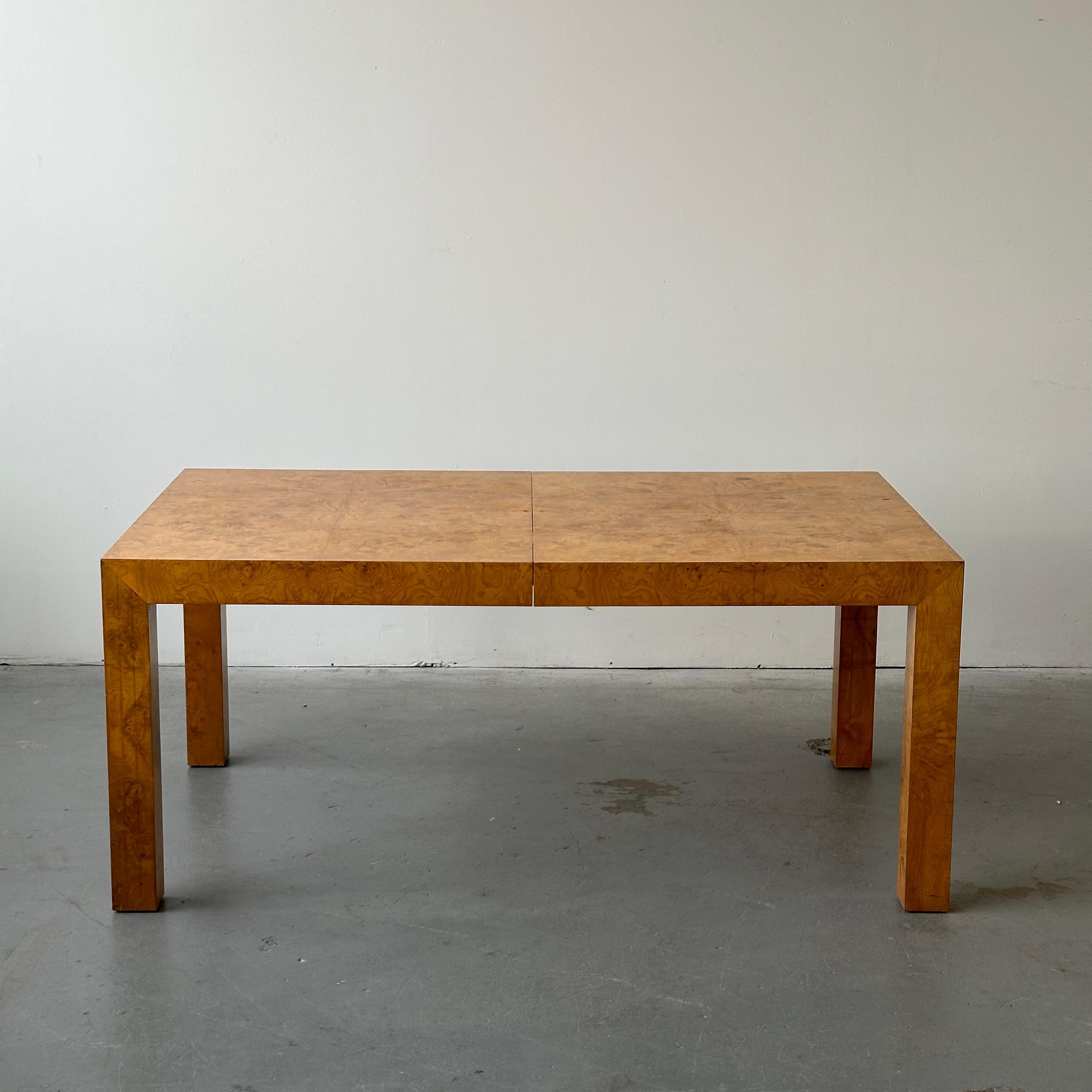 c. 1970s. Though this table was intended to extend, we do not have any additional leaves. There is also some wear to the surface of the table and some chips present on the legs