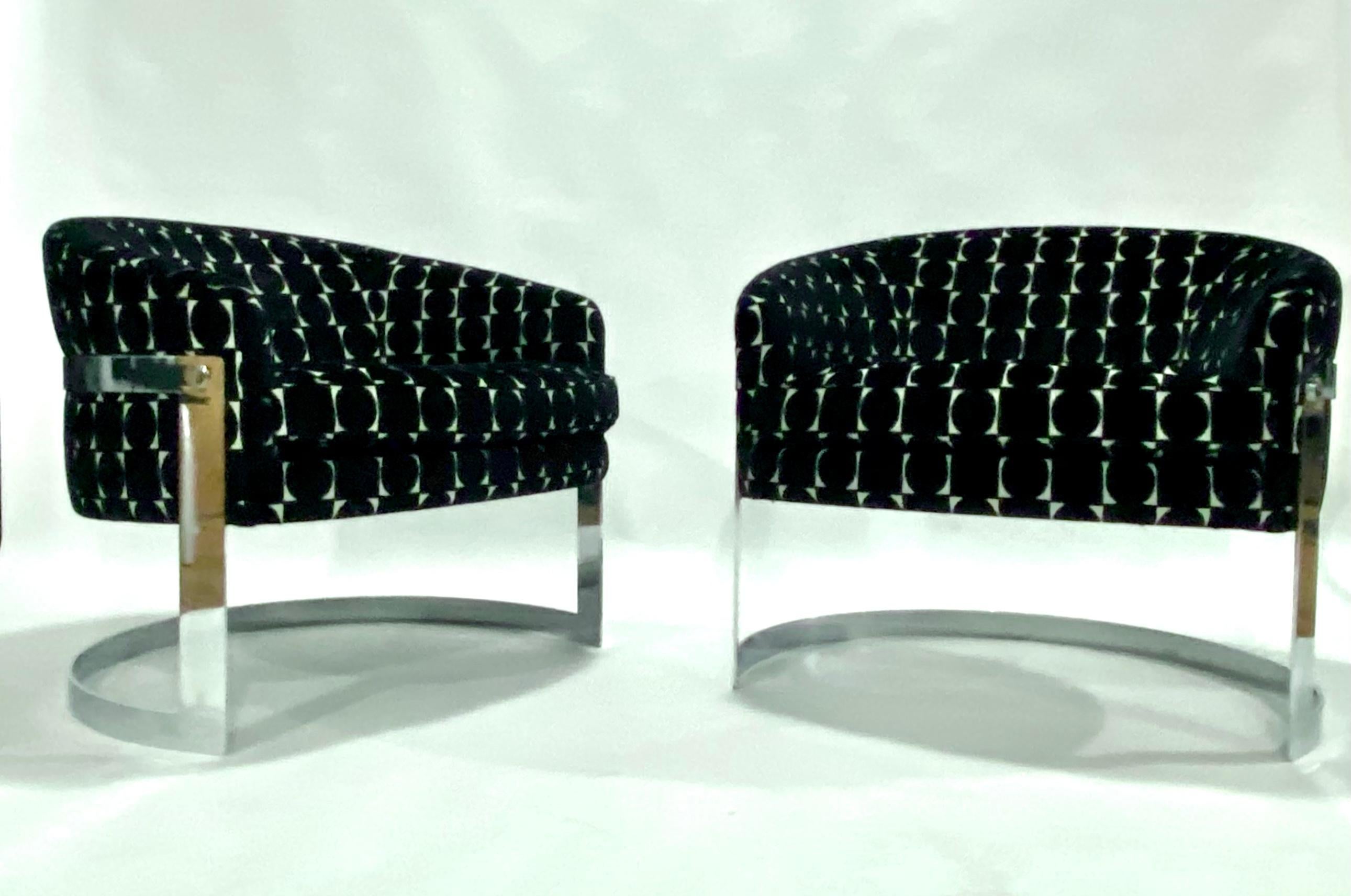 Flair Cantilevered barrel chairs on polished chrome steel frames newly upholstered in Gaston y Daniela geometric black and white fabric.
