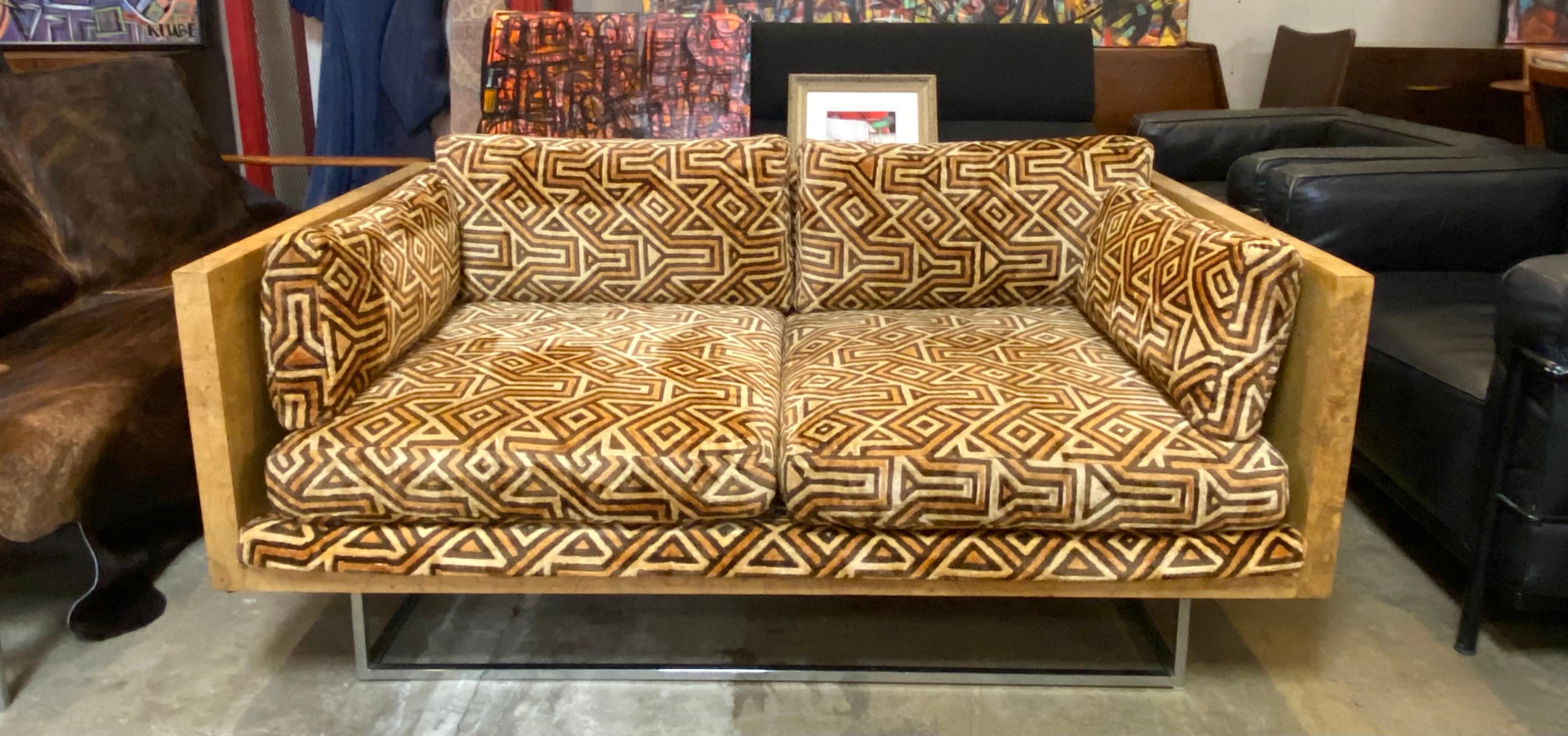 Milo Baughman case sofa for Thayer Coggin with burl wood, chrome legs and has the original upholstery by the internationally known textile designer, Jack Lenor Larsen. This vintage sofa loveseat from the 1970s is in great overall condition. 

