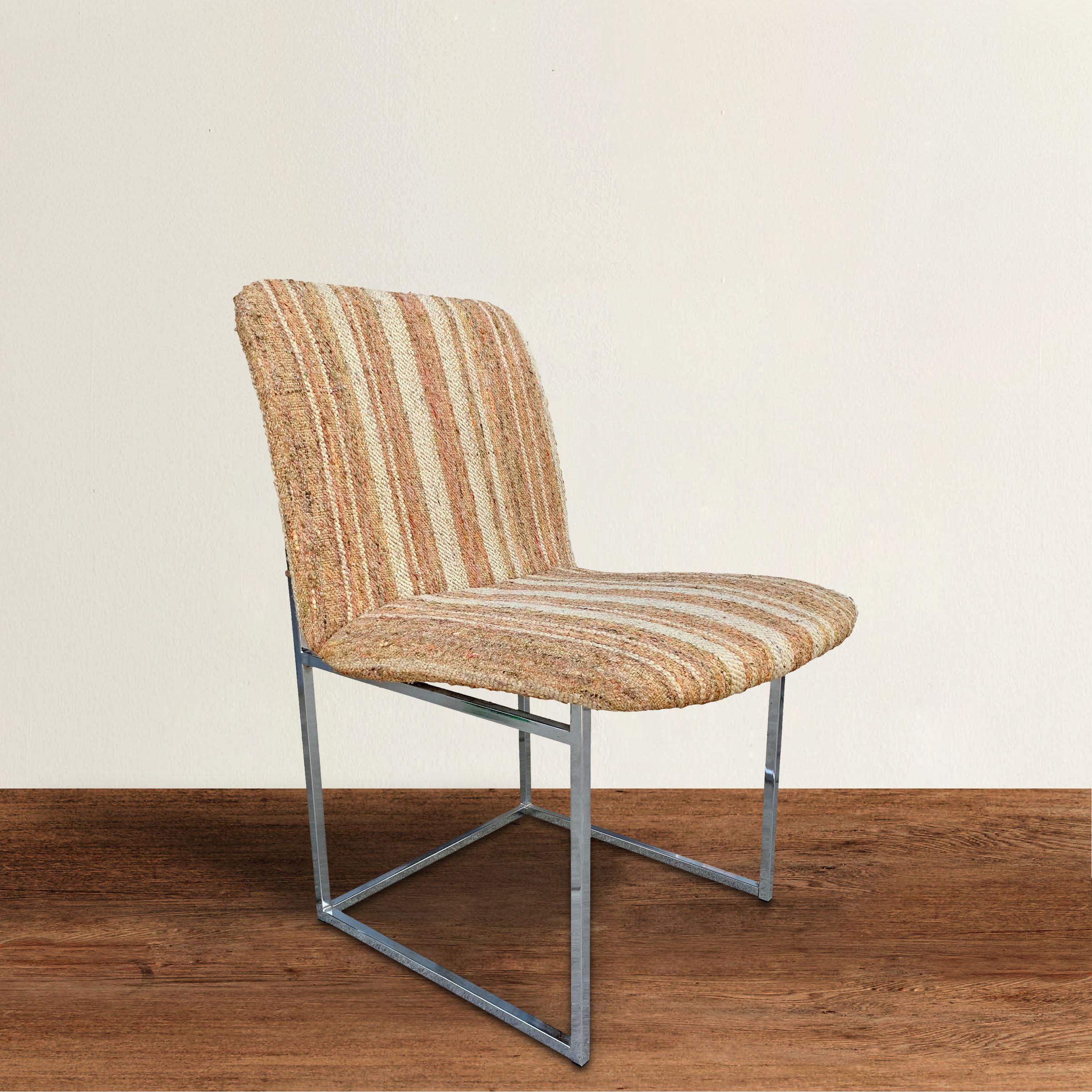 A wonderful Design Institute America chrome frame side chair with its original bouclé upholstered seat and back. Frame and upholstery are in great condition! Perfect at a desk, vanity, or as an occasional chair in your living room.