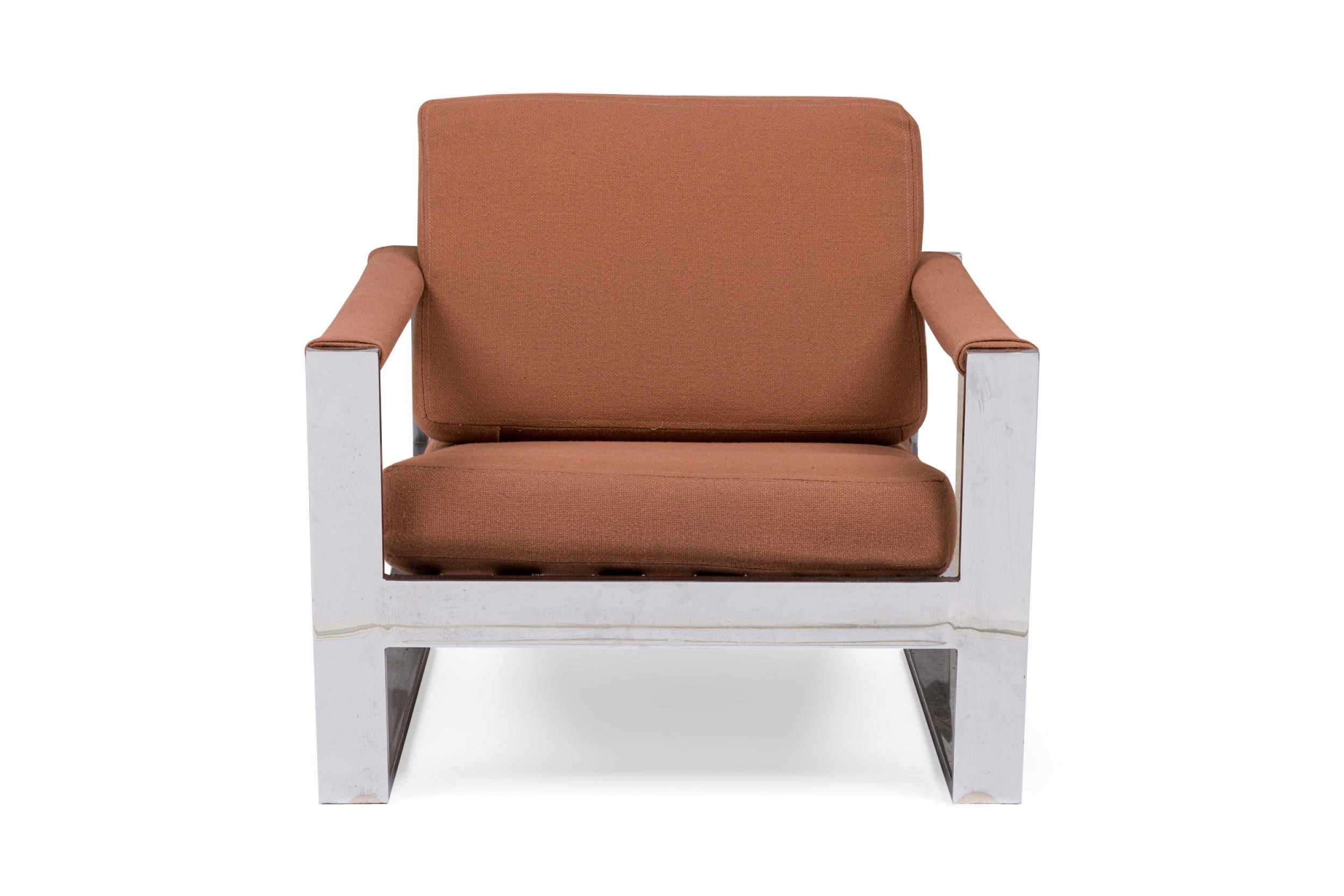 American Mid-Century 'Tank' form lounge / armchair with a flat bar polished chrome frame and dark pink upholstered seat, back and arm covers. (MILO BAUGHMAN)(Similar pieces: DUF0540, DUF0541)