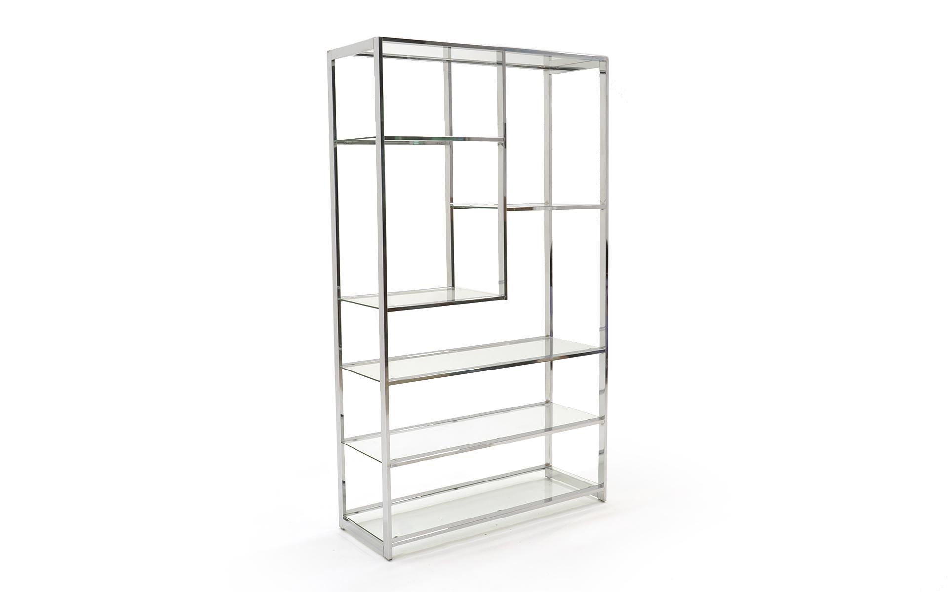 Chrome and glass étagère. Striking asymmetrical design. Very good to excellent condition.