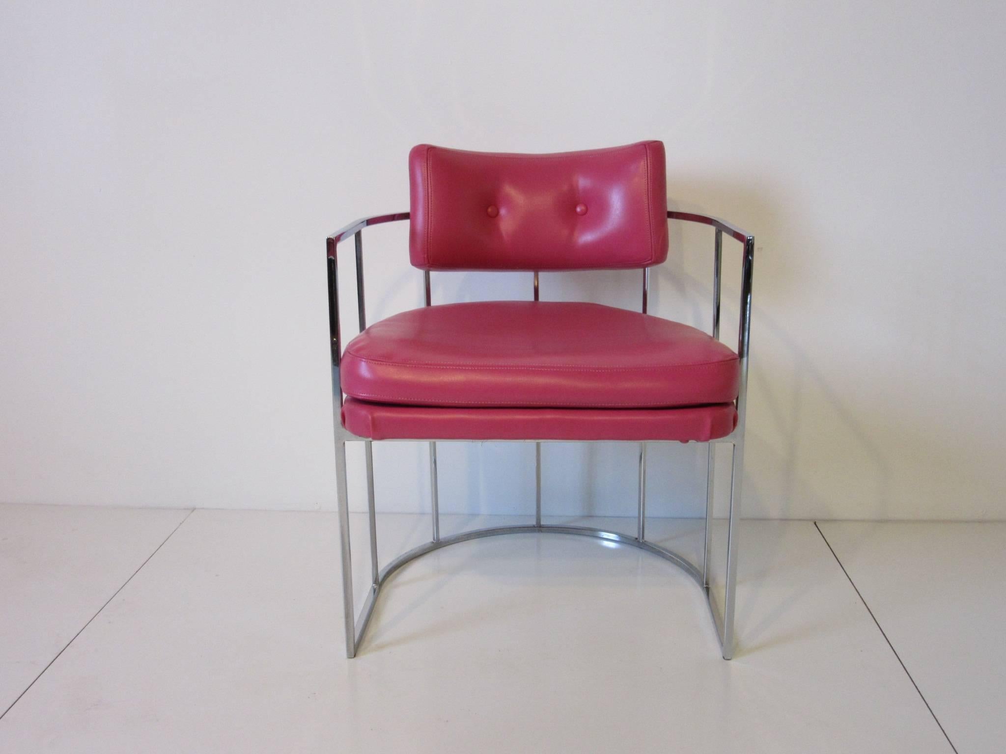 A pair of Milo Baughman designed chairs with square chrome bar frame and Magenta / Fuchsia colored Naugahyde upholstered back and bottom cushions. Retains the manufactures label to the seat by the Thayer Coggin furniture Company.