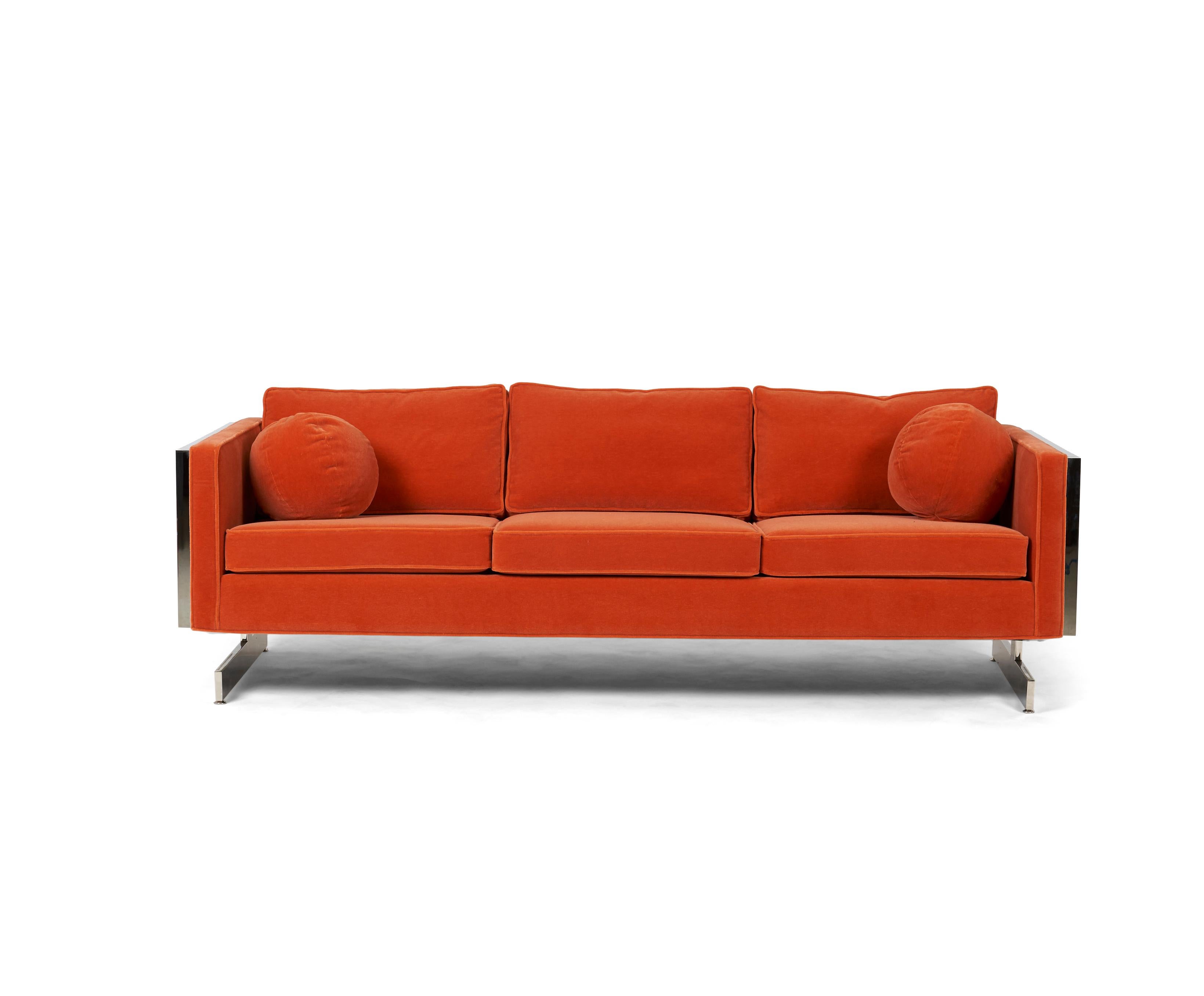 Milo Baughman chrome frame sofa. Newly upholstered in orange mohair.