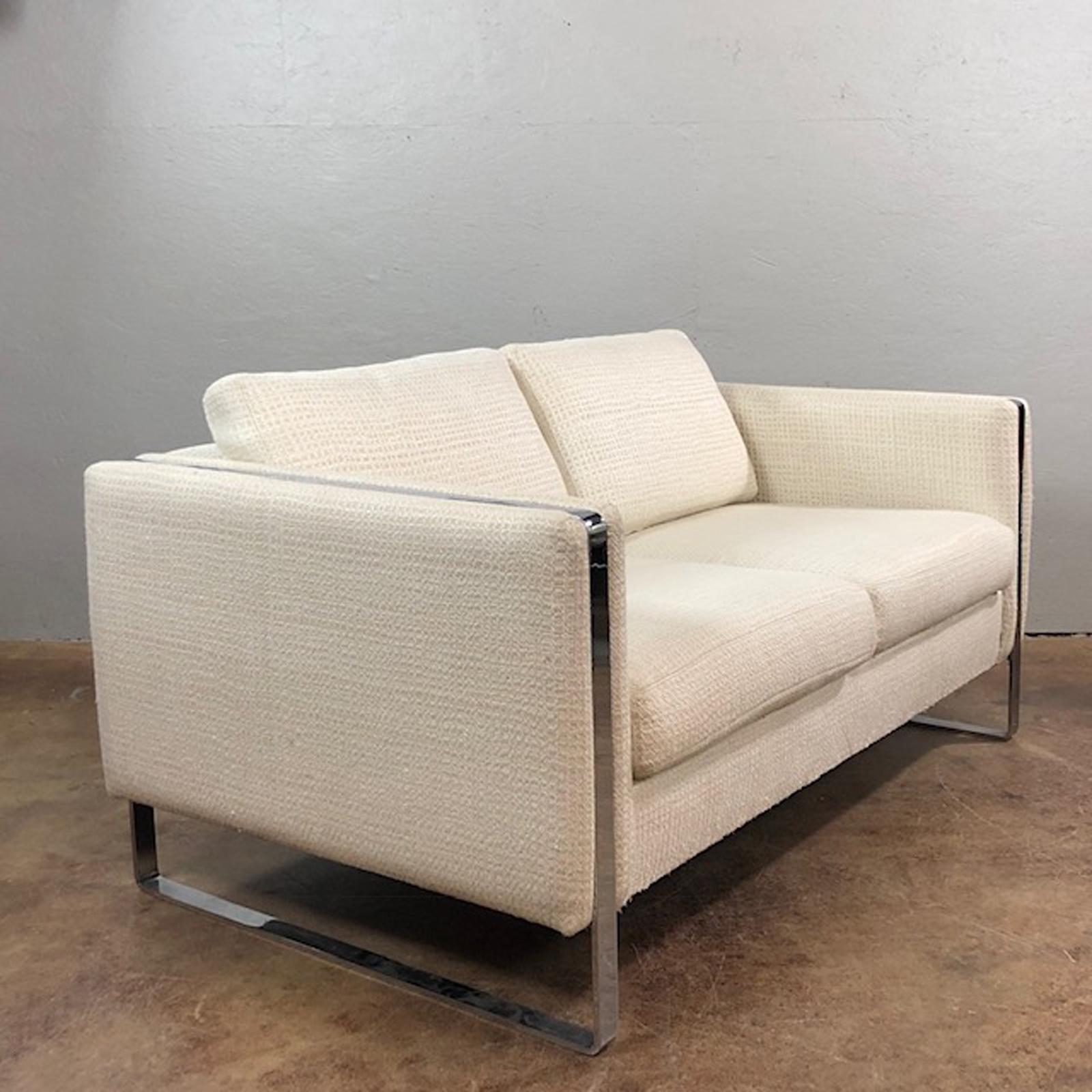 Milo Baughman sofa loveseat with chrome side frame wraps. Elegant. Unique, circa 1970s. Very good original condition. Cotton upholstery.