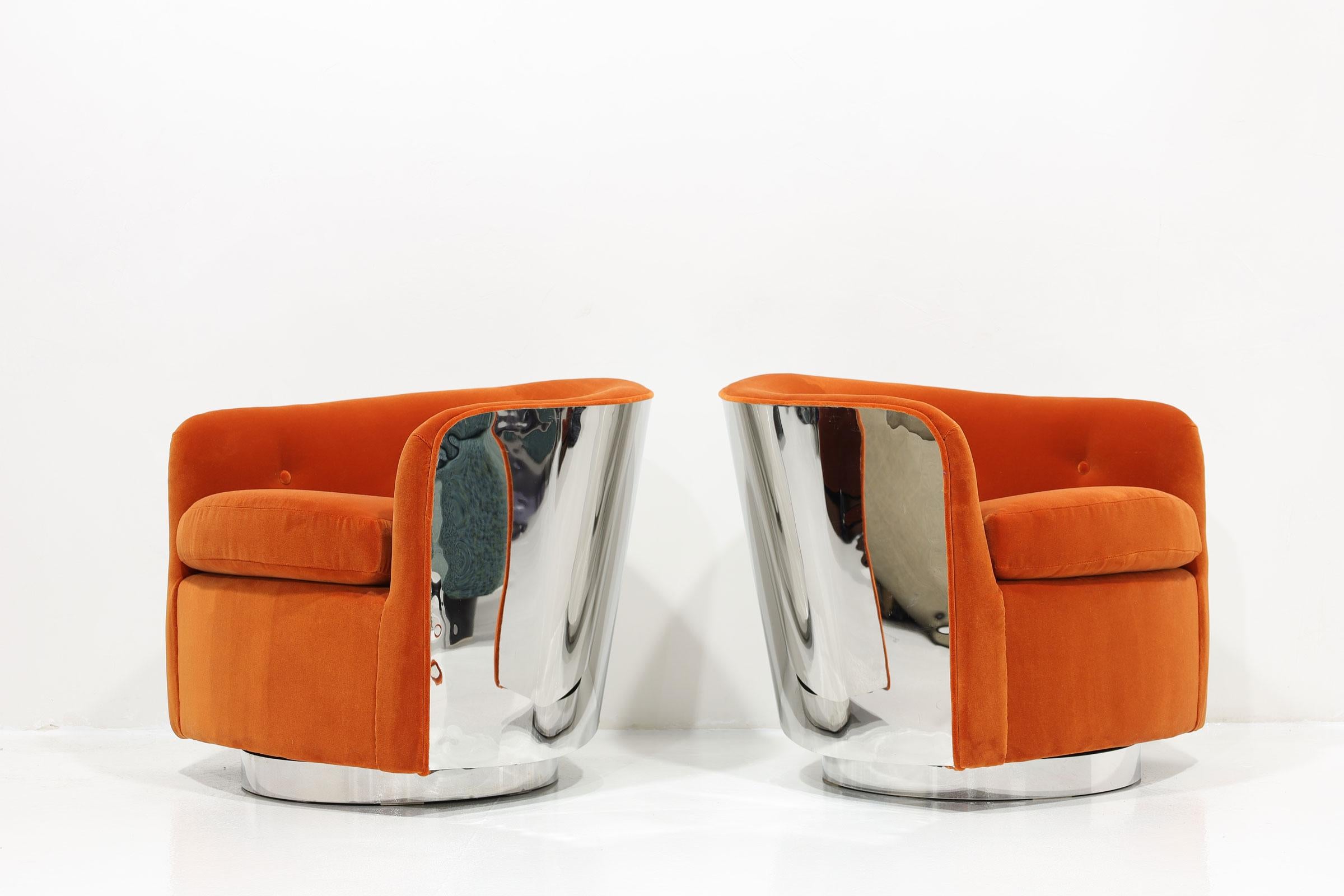 A stunning pair of Milo Baughman tilt/swivels with new upholstery in a mohair/velvet in a bright citrus. 