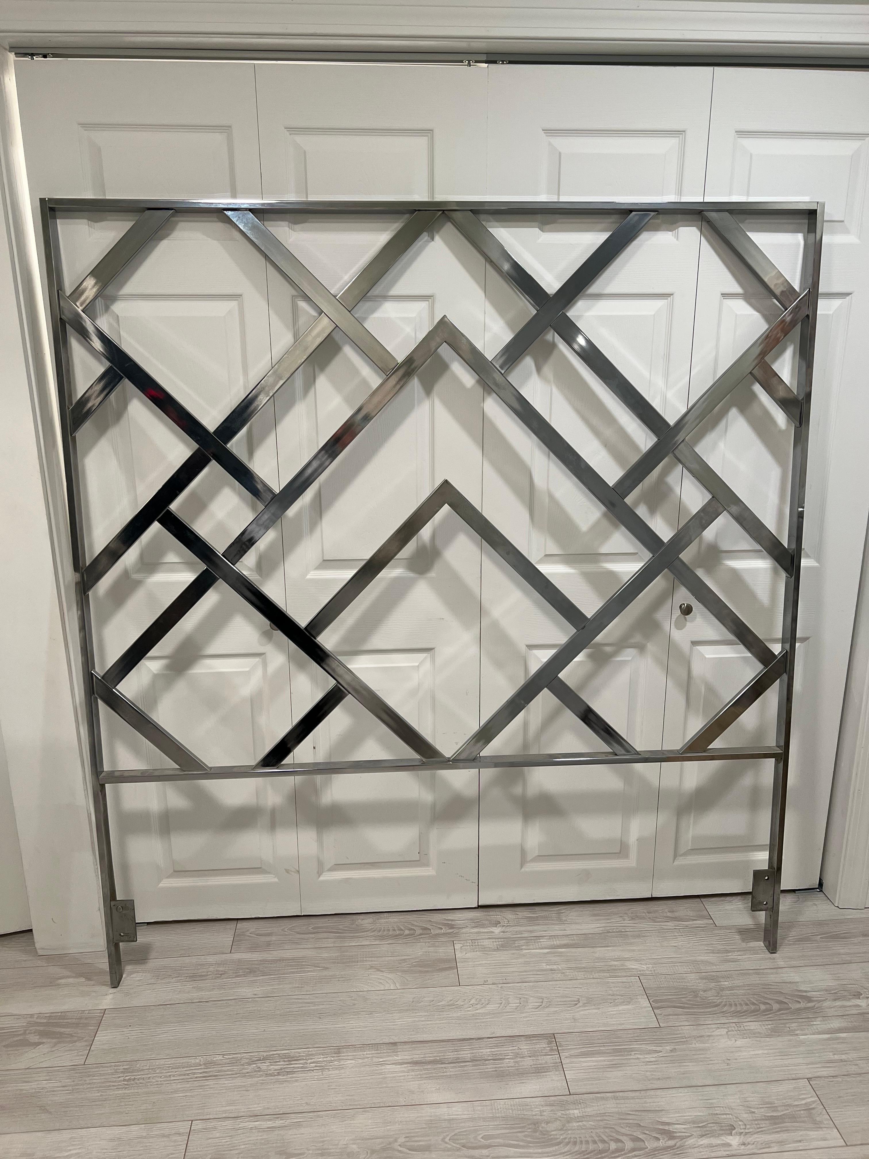 Mid Century Modern Milo Baughman Chrome Chinoiserie Headboard. Classic 1970's chevron lattice most likely produced by the Design Institute of America. Polished mirrored chrome will add some Hollywood glam to your room. Think Studio 54 meets Pierre