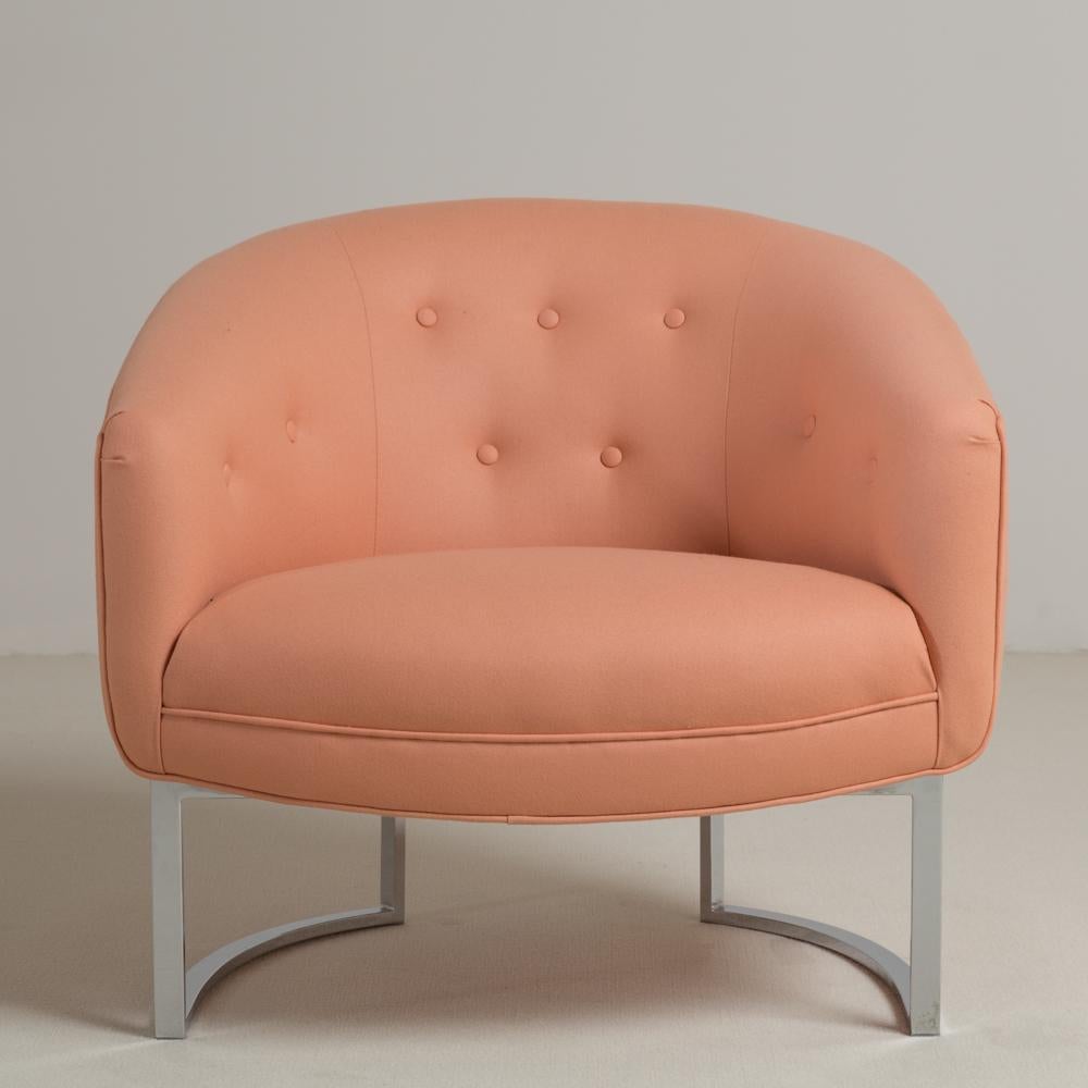 A single Milo Baughman style armchair upholstered in lambswool with buttoned back and sides set on two arched chromium steel legs, 1970s.

Milo Baughman Design Inc was established in 1947. In 1948 he helped create the California Modern collection