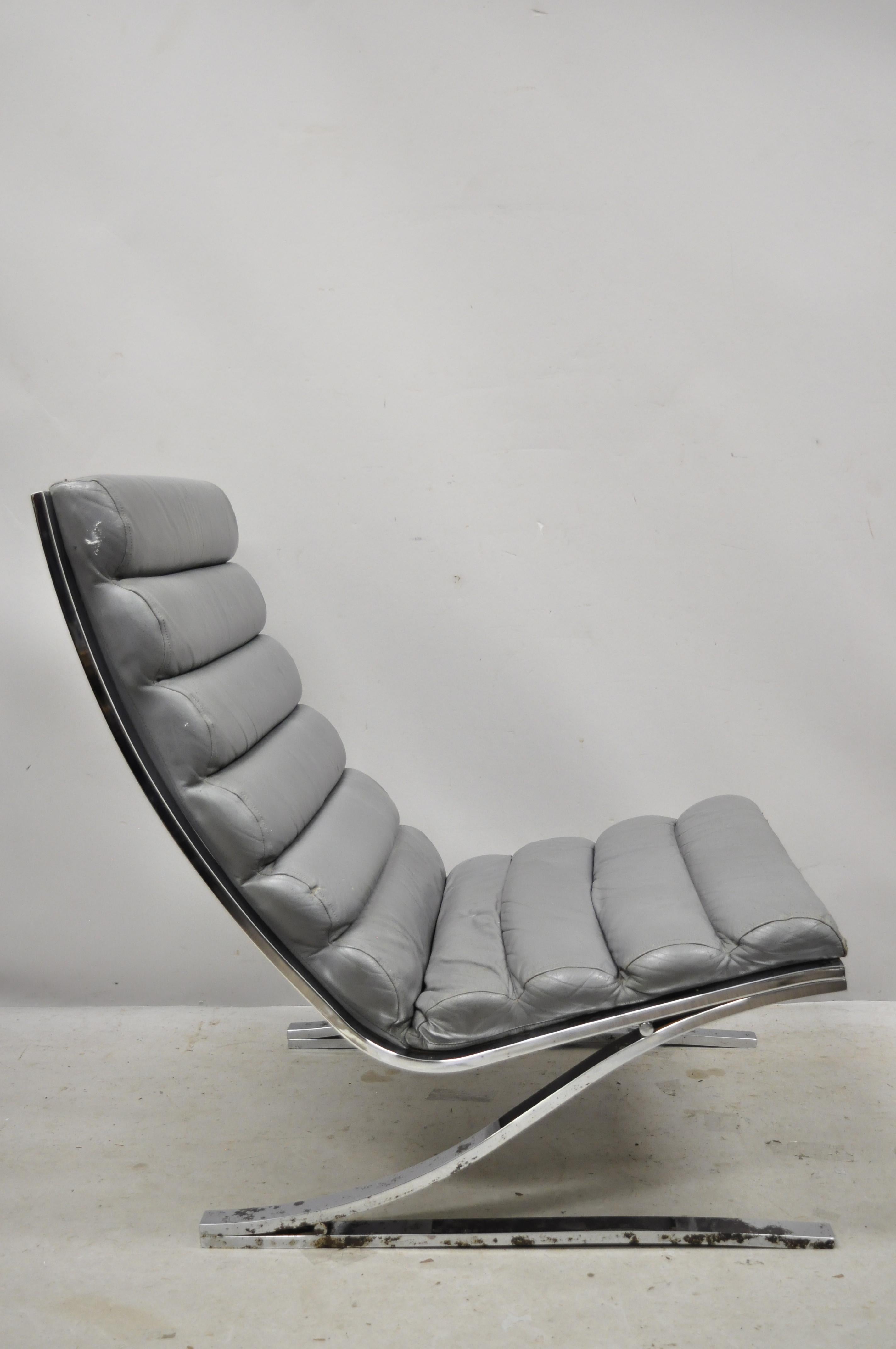 George Mulhauser Design Institute of America DIA chrome steel grey leather lounge club chair. Item features heavy chrome-plated steel frame, gray leather channeled upholstery, original label, clean modernist lines, sleek sculptural form, circa mid
