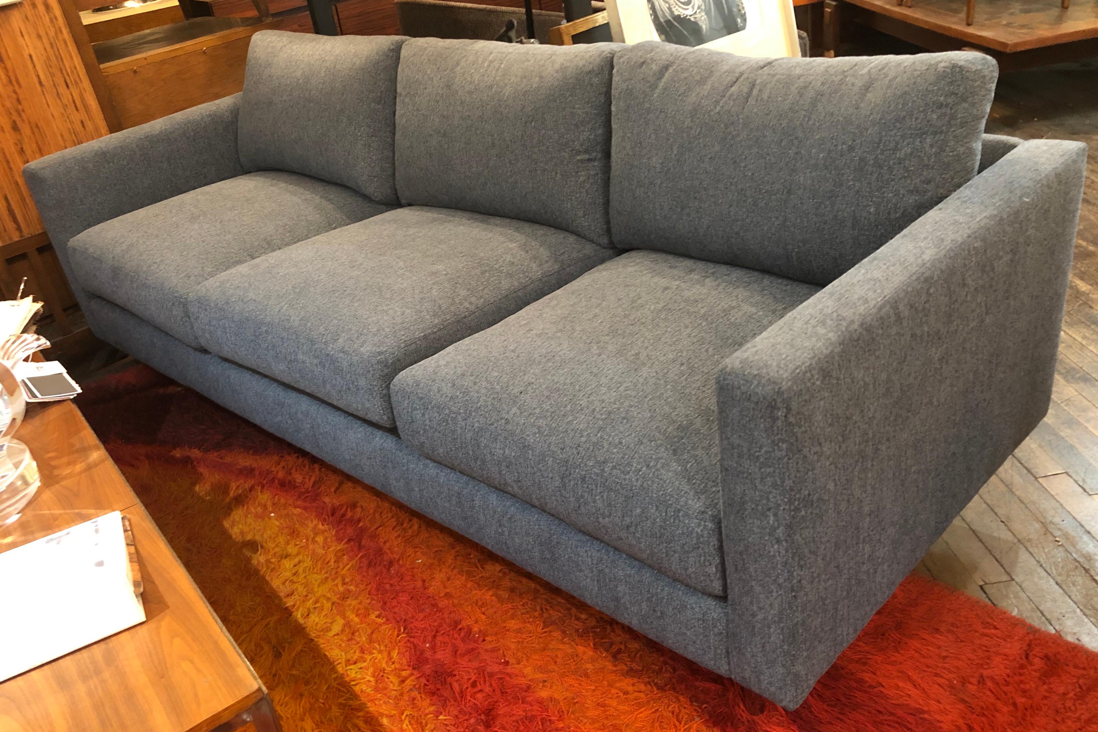Designed by Milo Baughman in 1964, this simple and handsome sofa is still the perfect fit for a modern home. Three soft seats, fully upholstered frame, set on polished chrome legs. Covered in a blue performance polyester fabric.
Please confirm