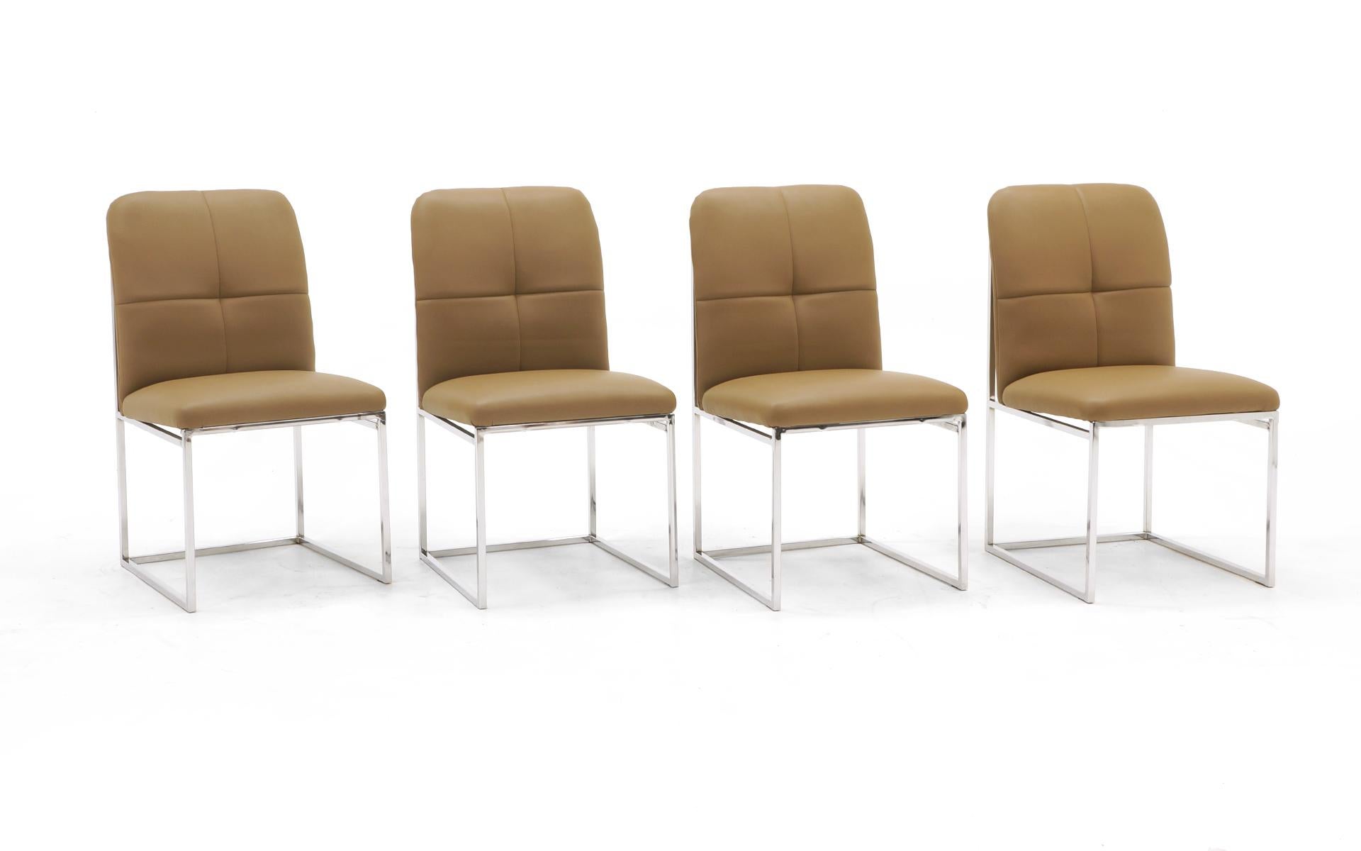 Set of four Milo Baughman dining chairs reupholstered in a tan leather. Beautiful set.