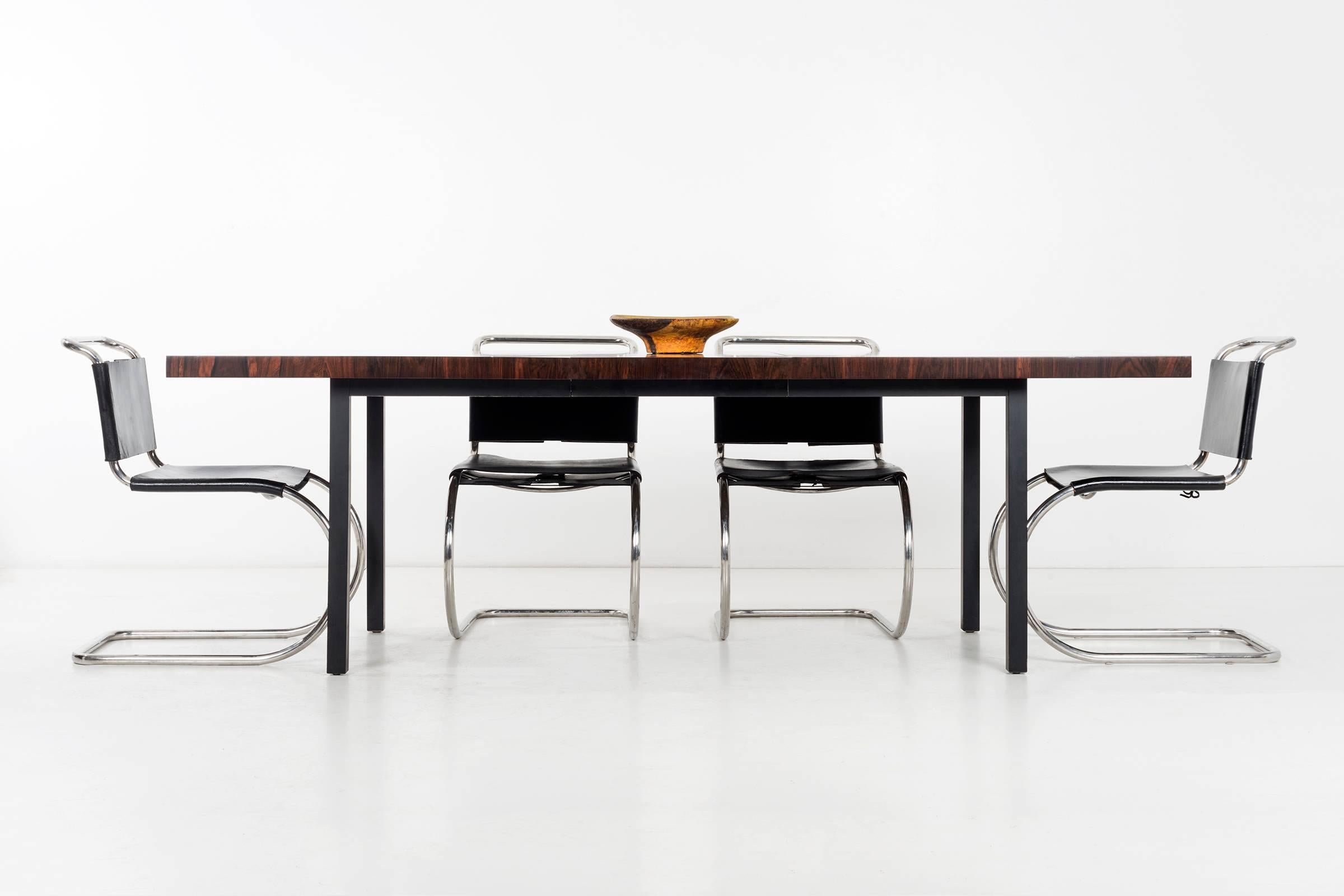 Milo Baughman Dining Table for Directional, Striped multi-wood table top: rosewood, walnut, and ash. Two additional matching leaves.
The Table extends from 72