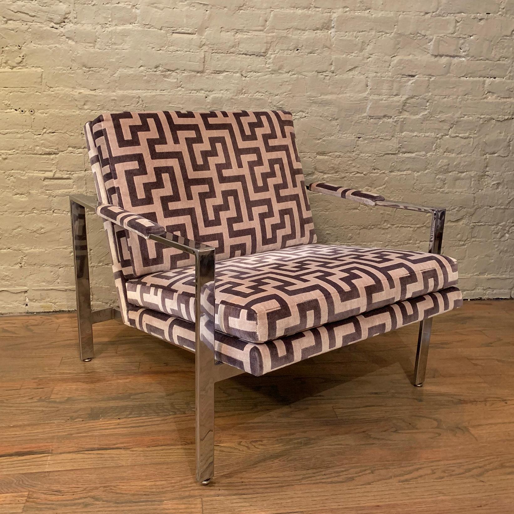 Mid-Century Modern, lounge chair by Milo Baughman for Thayer Coggin features a cubed chrome, flat bar frame with newly upholstered body and armrests in a striking, geometric print velvet.