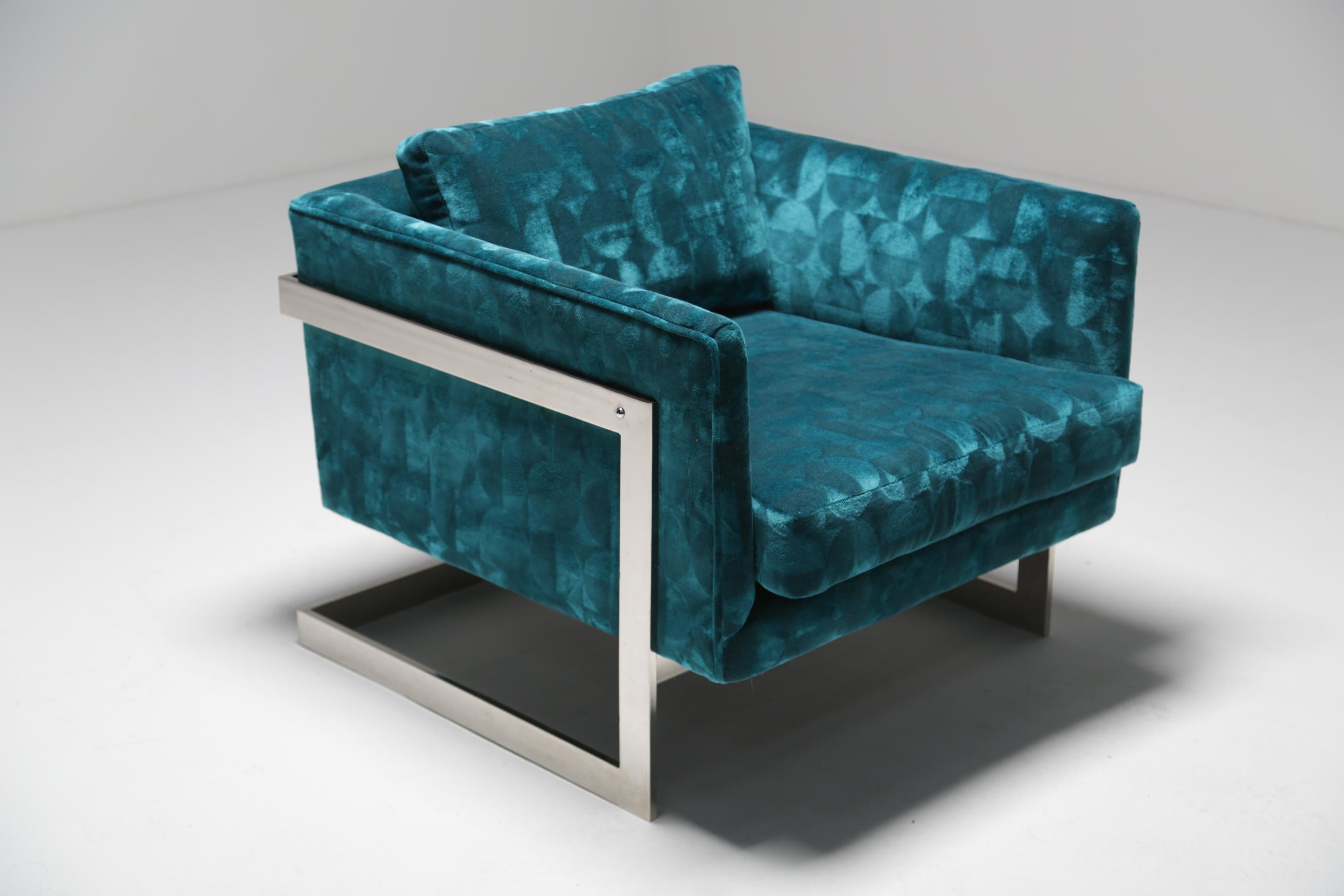 Offered here is the larger size of the now famous Milo Baughman floating cube lounge chair. This chair was designed by Milo Baughman and produced by Thayer Coggin sometime in the early 1970s. We have recently recovered this piece in a patterned teal