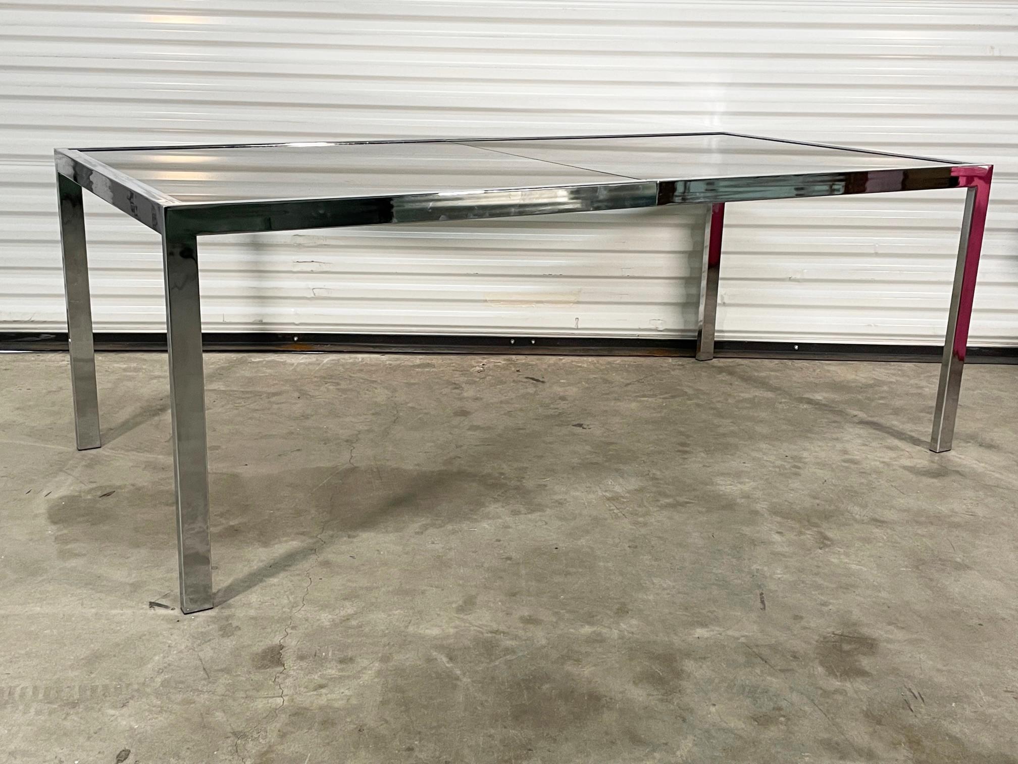 Midcentury chrome dining table by Milo Baughman for Design Institute of America features smoked glass and expands to 96