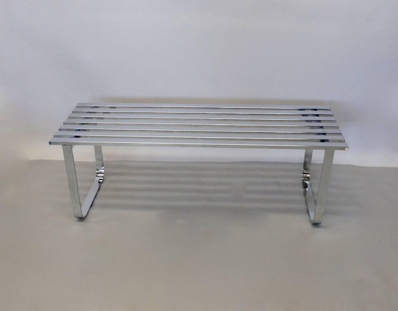 Milo Baughman for Design Institute America. Chrome slat bench with chrome legs. Nice condition. Top surface shows wear from everyday use. There is one tiny ding on one slat. I could not get it to show in images.