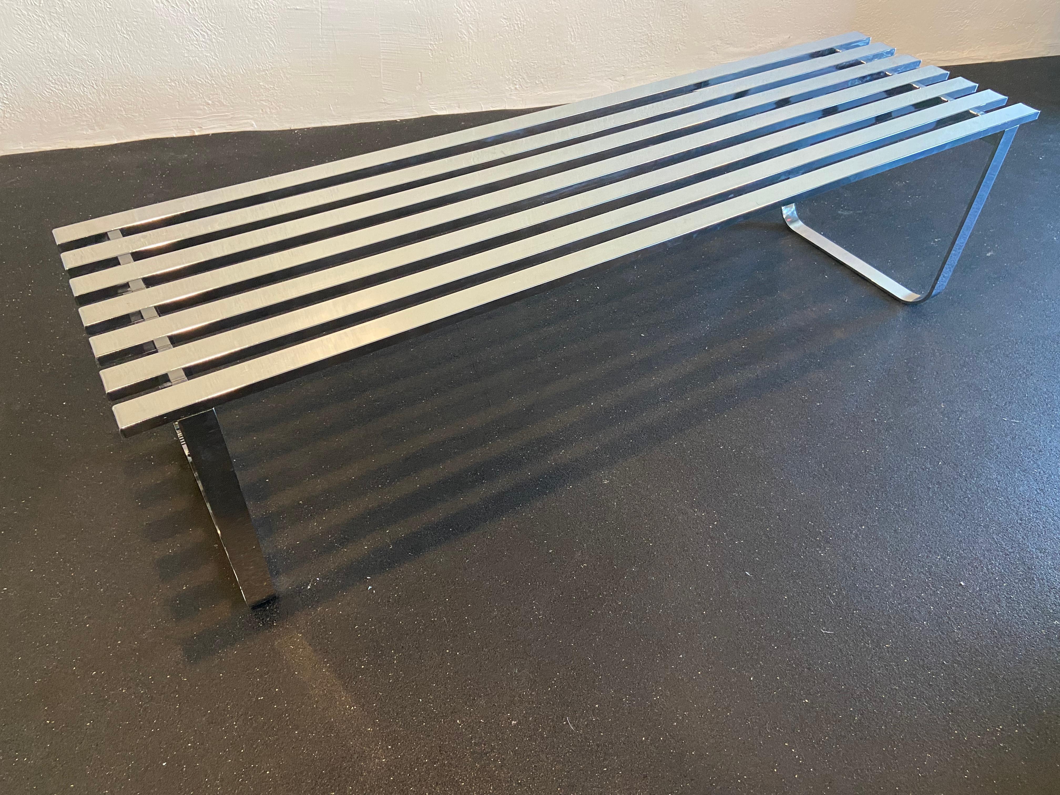 Design Institute Of America chrome slatted bench. Light surface scratches consistent with use and one area of chrome loss. (Please refer to photos) 

Would work well in a variety of interiors such as modern, mid century modern, Hollywood regency,