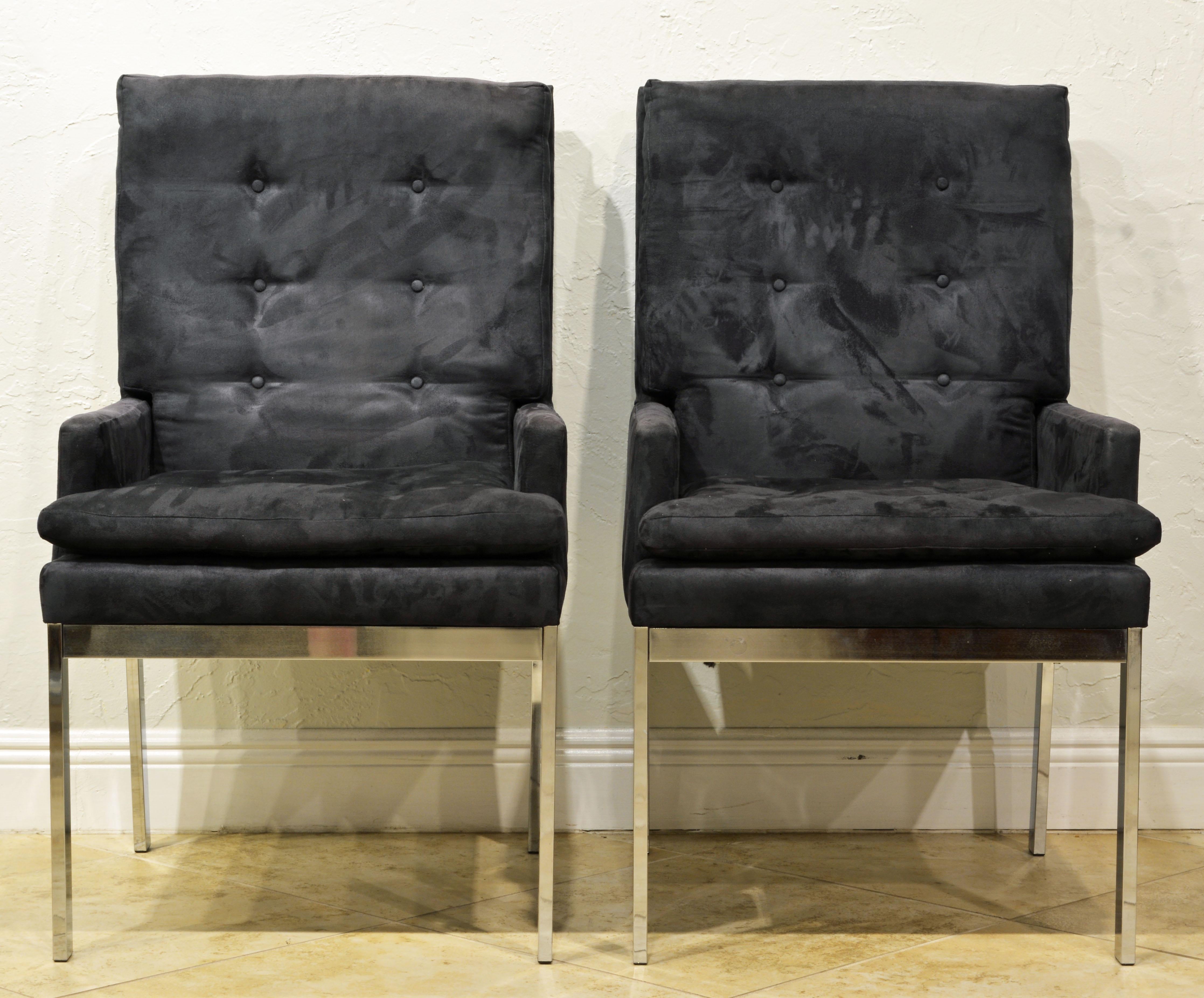 These armchairs made by Design Institute of America feature charcoal (with a slight bluish tint) suede covered upholstery and elegant chrome frames and legs. A modern Classic.