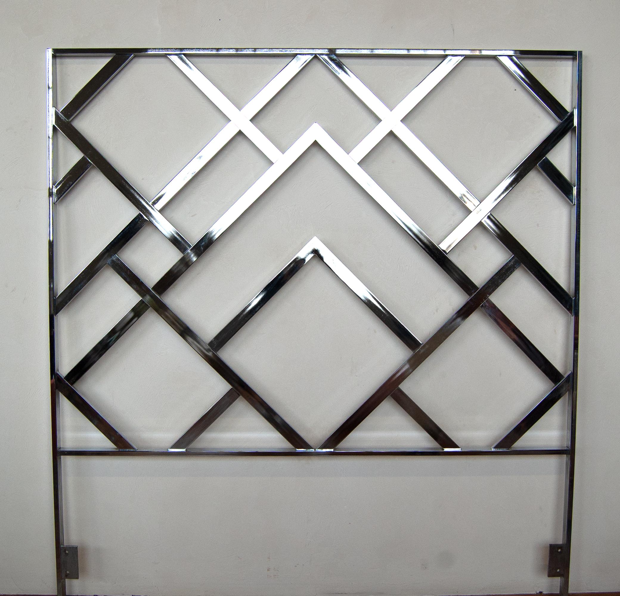 Beautiful Hollywood Regency style, chrome headboard in a timeless geometric fretwork pattern, designed by Milo Baughman for Design Institute American. 

Founded in 1972, DIA was a design-driven producer of furniture for wall units, occasional,
