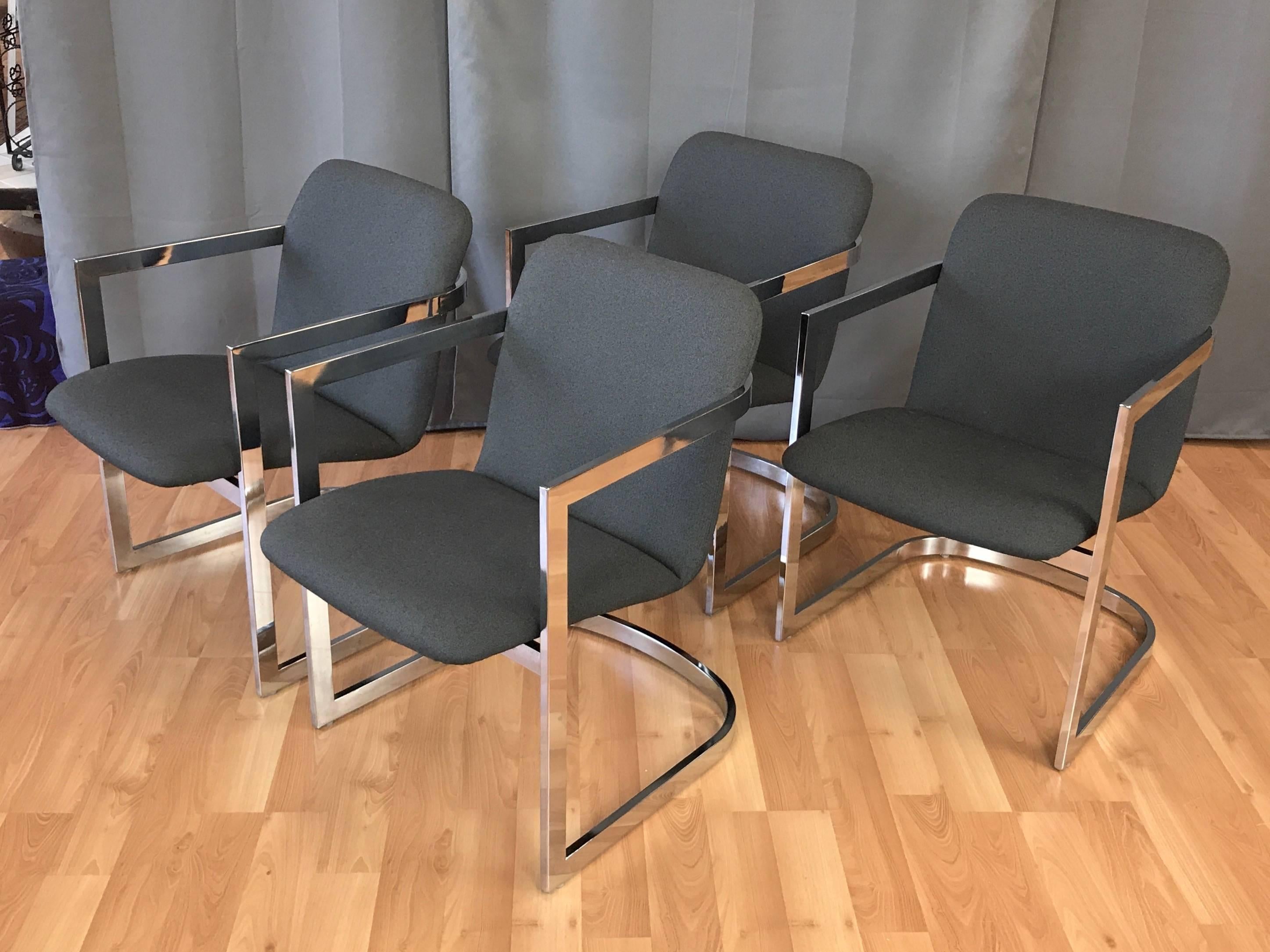 A four-piece set of fantastically handsome and uncommon chrome armchairs by Milo Baughman for Design Institute America.

Minimalist chromed steel frame with a symmetrical cantilevered design defined by a visually continuous line. Reminiscent of Mies