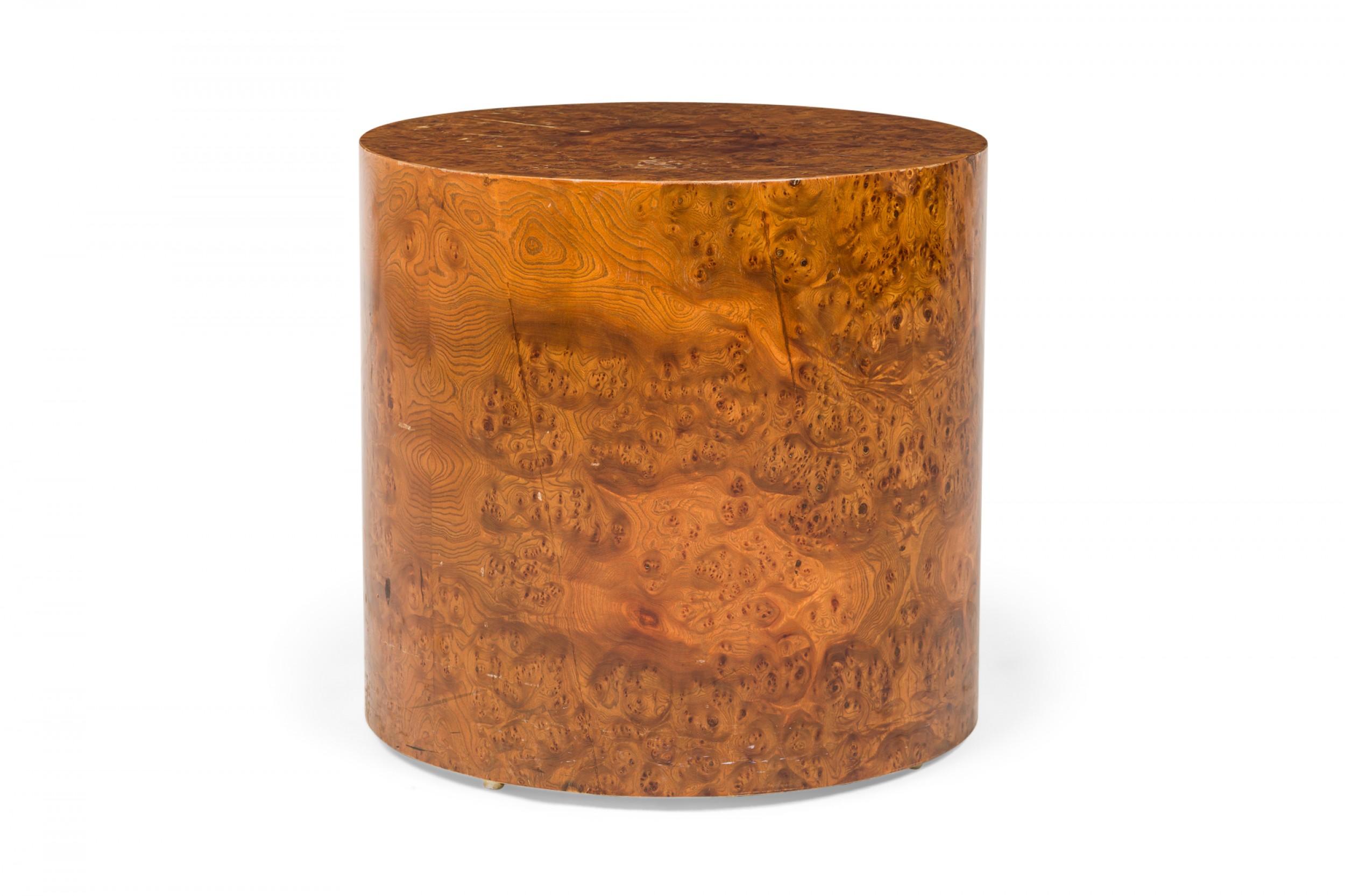 American Mid-Century drum form end / side table with an ash burl wood veneer. (MILO BAUGHMAN FOR DIRECTIONAL FURNITURE COMPANY)