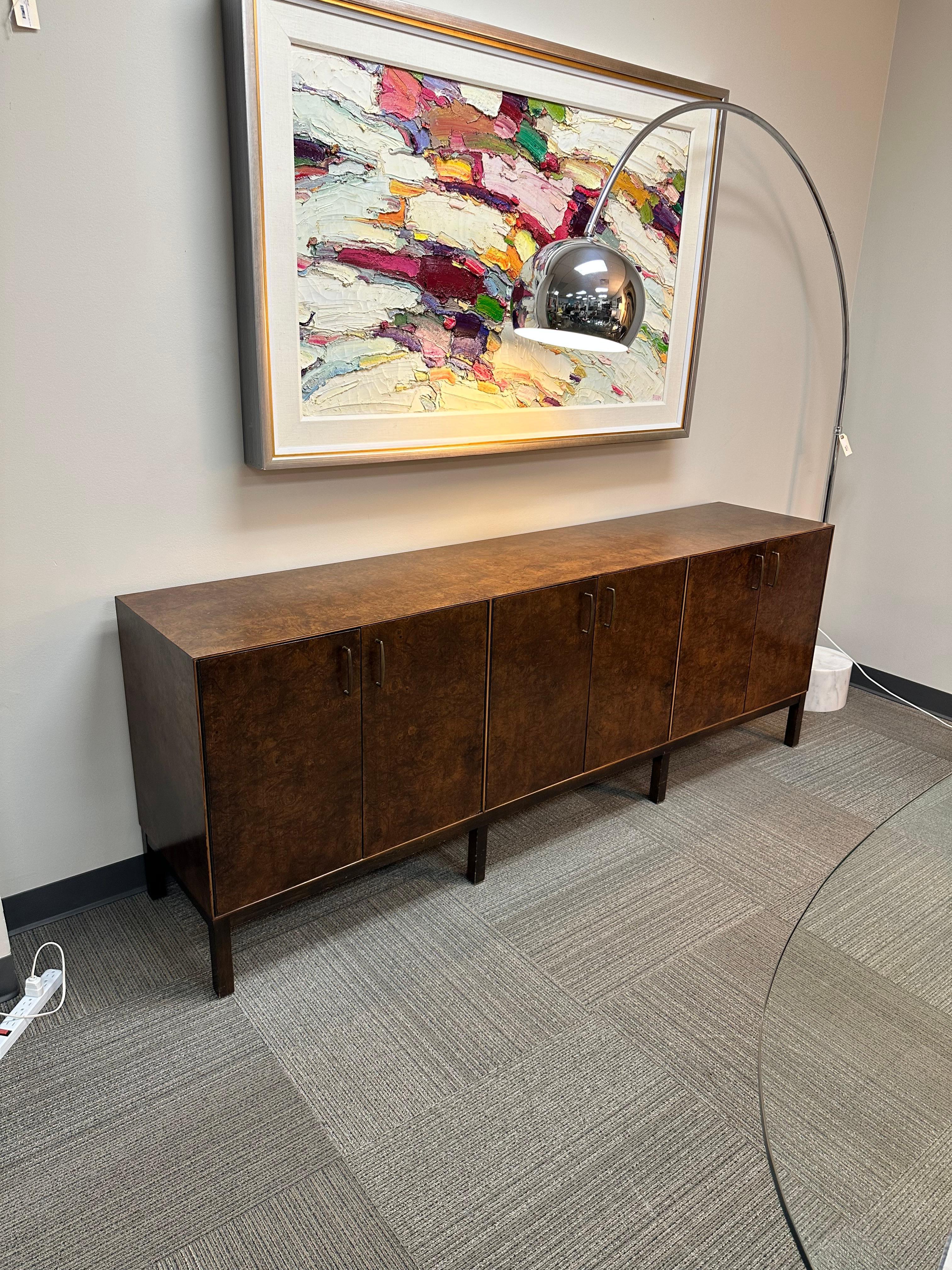 Milo Baughman for Directional Burled Walnut Sideboard or Credenza

A beautiful burled walnut sideboard or credenza by American designer Milo Baughman (1923-2003) for Directional Furniture. This is a solid and well-constructed piece, with three