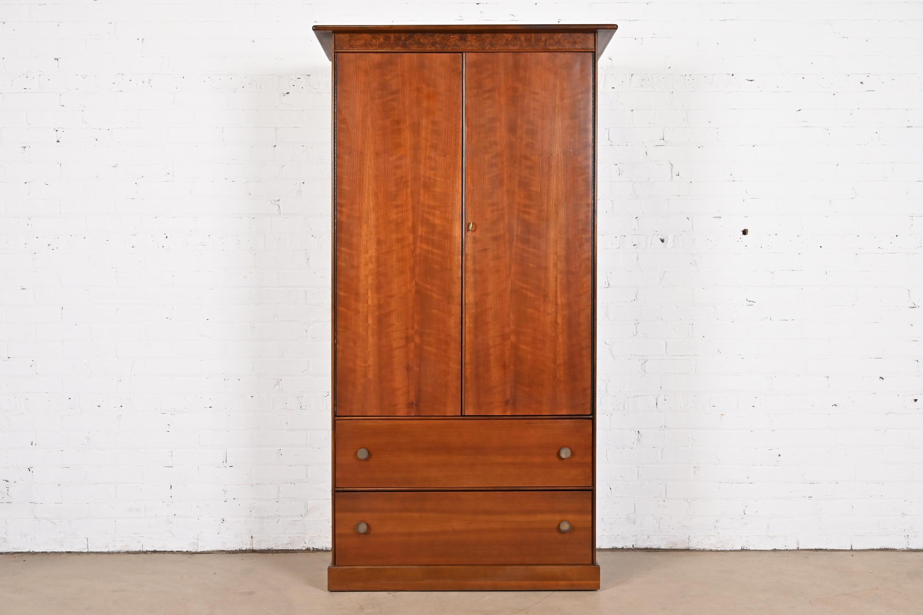 A rare and outstanding Mid-Century Modern armoire dresser

By Milo Baughman for Directional, 