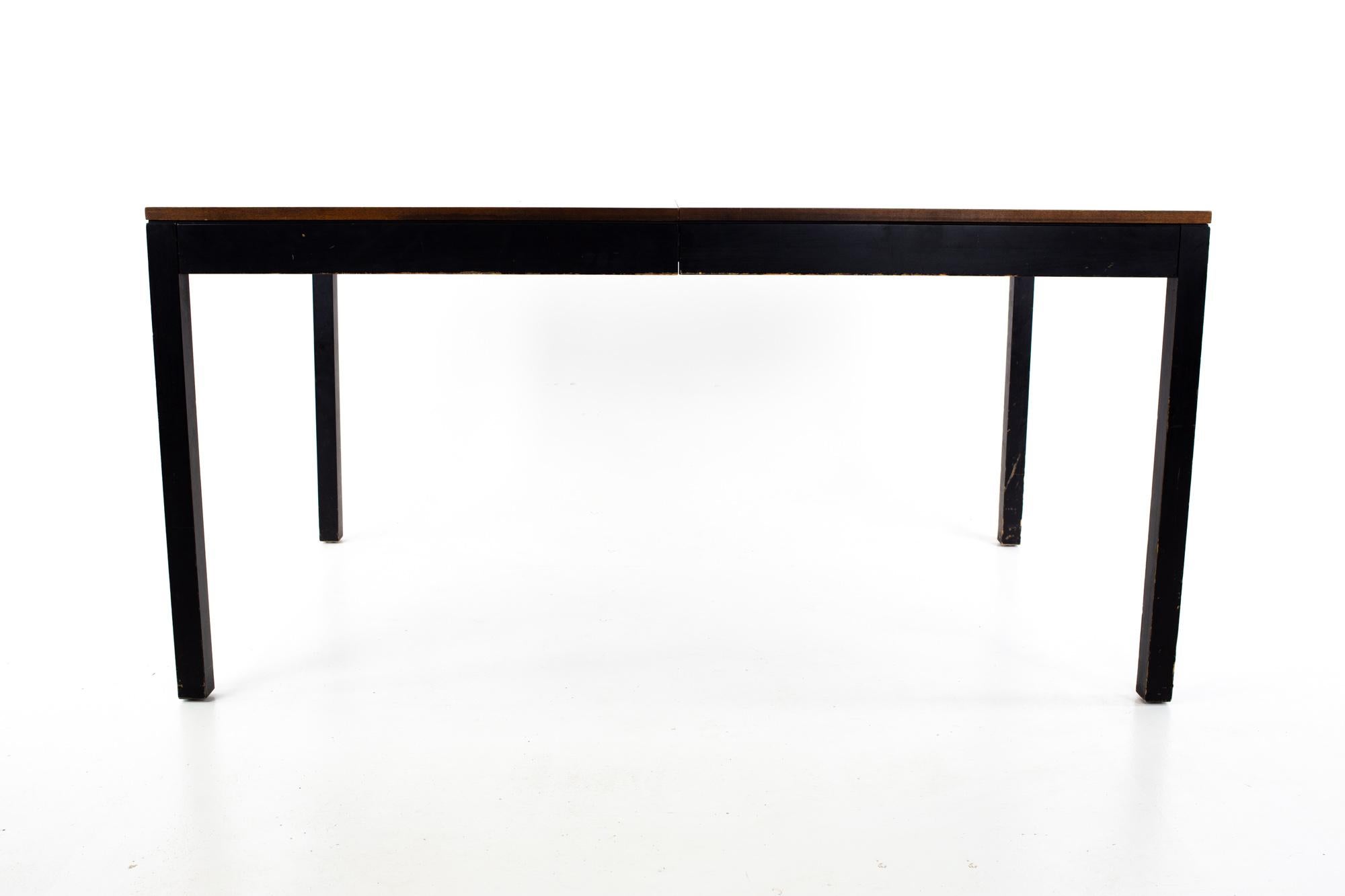 Milo Baughman for Directional Mid Century rosewood walnut and oak Parsons table
Table measures: 60 wide x 38 deep x 29.25 inches high

This piece is available in what we call restored vintage condition. Upon purchase it is fixed so it’s free of