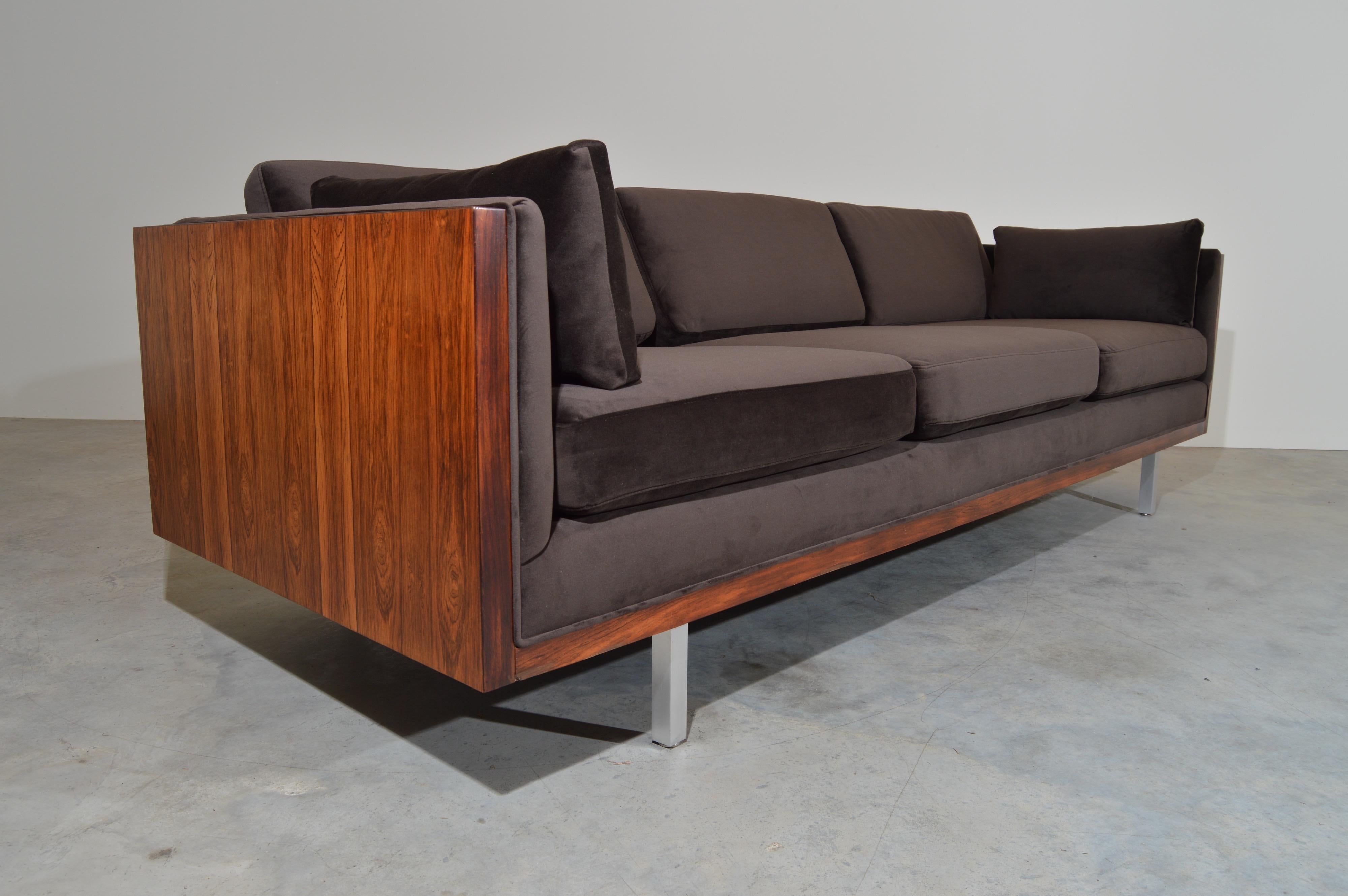 Milo baughman for directional rosewood panel case sofa in “Royale Chocolate” Performance Velvet. 
In excellent condition having new high end velvet upholstery with new cushioning as well. Original DIRECTIONAL tag is in tact. 
Extremely soft and