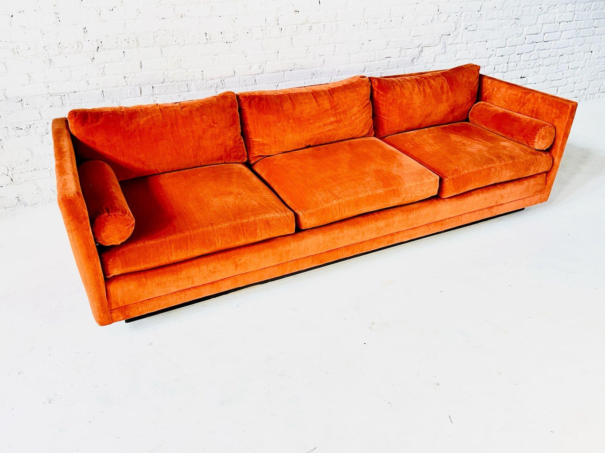 Milo Baughman for Directional Floating Tuxedo Sofa in Orange Velvet on Plinth Base, 1960’s.  Original upholstery in great vintage condition.
Measures 26” tall 100” long 37” deep seat height 17” seat depth 25”