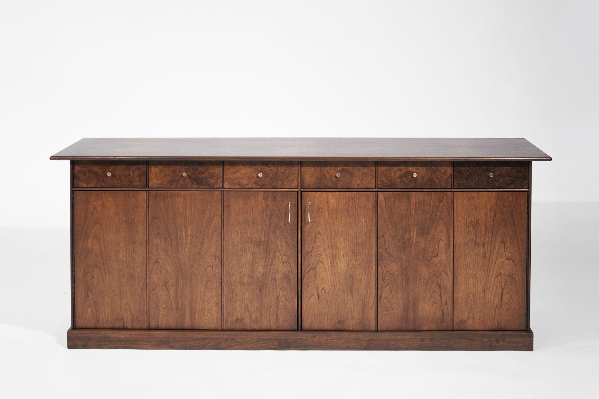 A rare gem from the Mid-Century Modern era – a captivating, fully restored credenza or dresser meticulously crafted by Milo Baughman for his esteemed Country Villa collection for Directional. This exquisite dresser showcases the unparalleled beauty