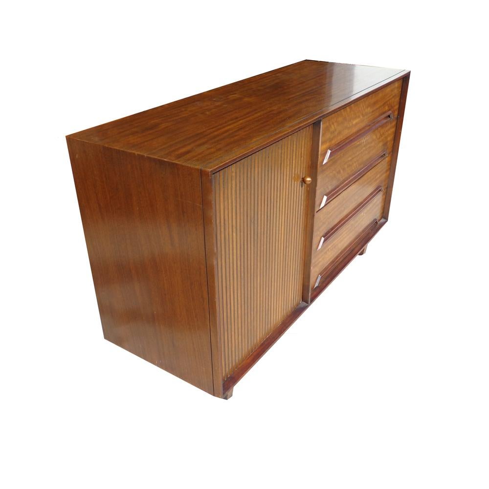 Milo Baughman for Drexel Perspective buffet or credenza

This gorgeous Drexel credenza was part of a special collection designed by Milo Baughman in the 1950s. Has a sleek finish, reflection can be seen in photos. Still has its original label