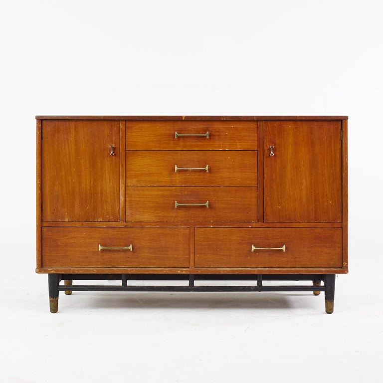 Milo Baughman for Drexel Todays Living Mid Century Credenza

This credenza measures: 48 wide x 18.25 deep x 30.5 inches high

All pieces of furniture can be had in what we call restored vintage condition. That means the piece is restored upon