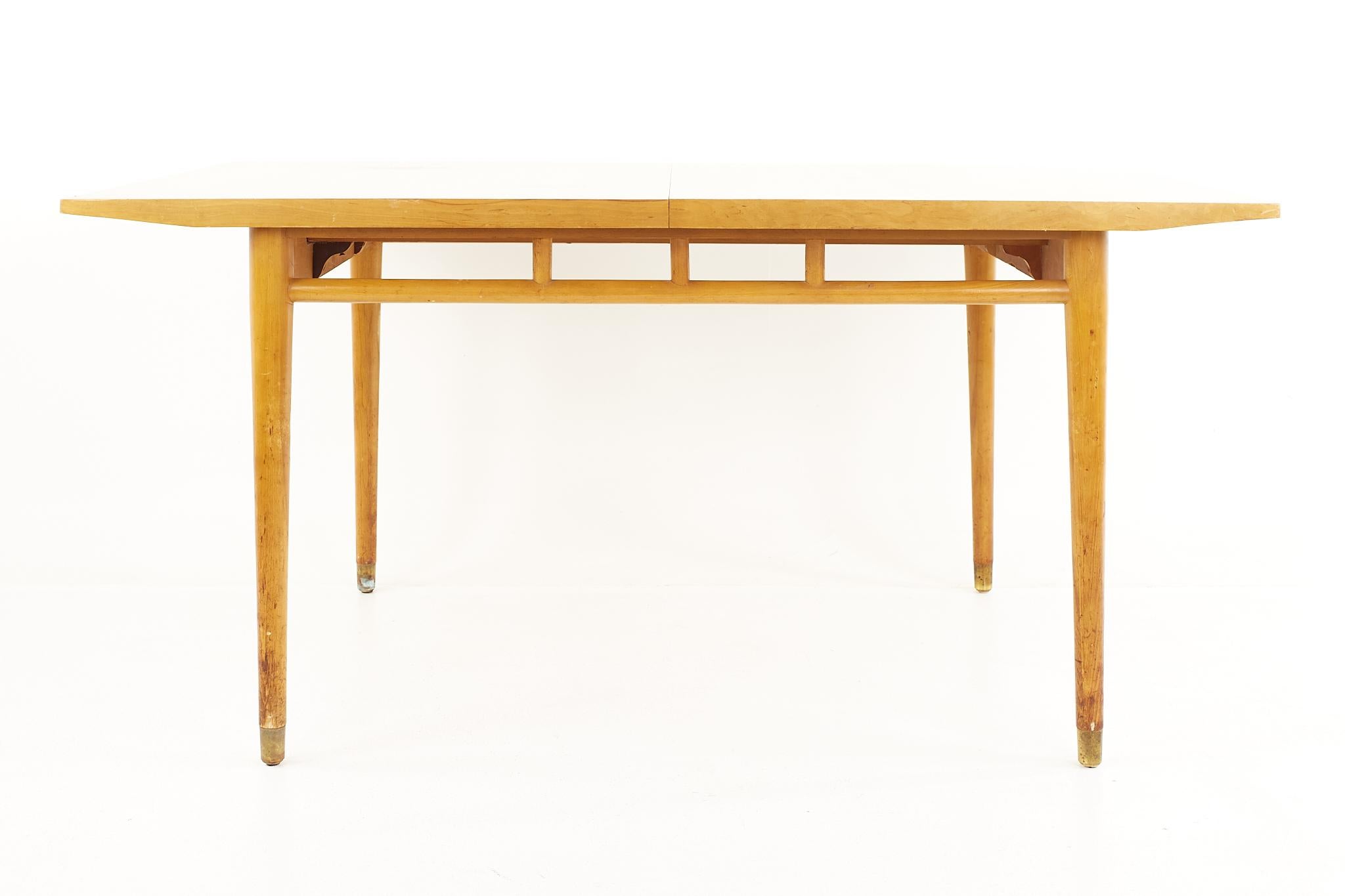 Milo Baughman for Drexel todays living Mid Century dining table with 3 leaves

The table measures: 62 wide x 40 deep x 29.5 high, with a chair clearance of 23.75 inches; each leaf measures 12 inches wide, making a maximum table width of 98 inches