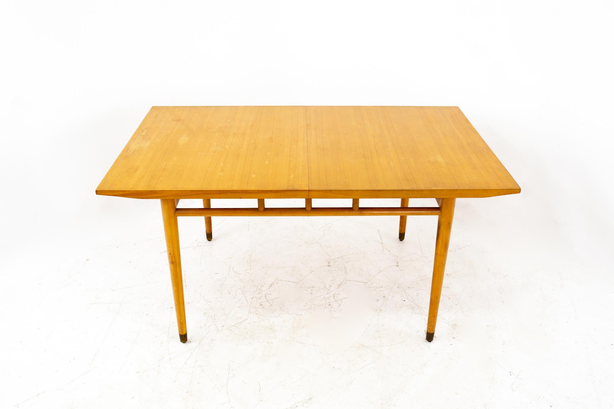 Milo Baughman for Drexel todays living Mid Century blonde dining table

Table with no leaves measures: 62 wide x 40 deep x 30 high
Table with 2 leaves measures: 86 wide x 40 deep x 30 high
Each leaf is 12 inches wide 

This piece is available in