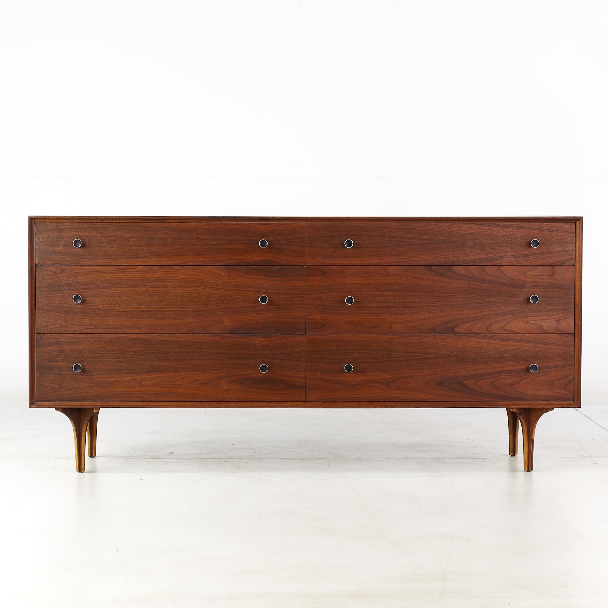 Glenn of California Mid Century rosewood 6 drawer dresser in the style of Milo Baughman

This dresser measures: 64.75 wide x 17.75 deep x 30.5 inches high

All pieces of furniture can be had in what we call restored vintage condition. That means the