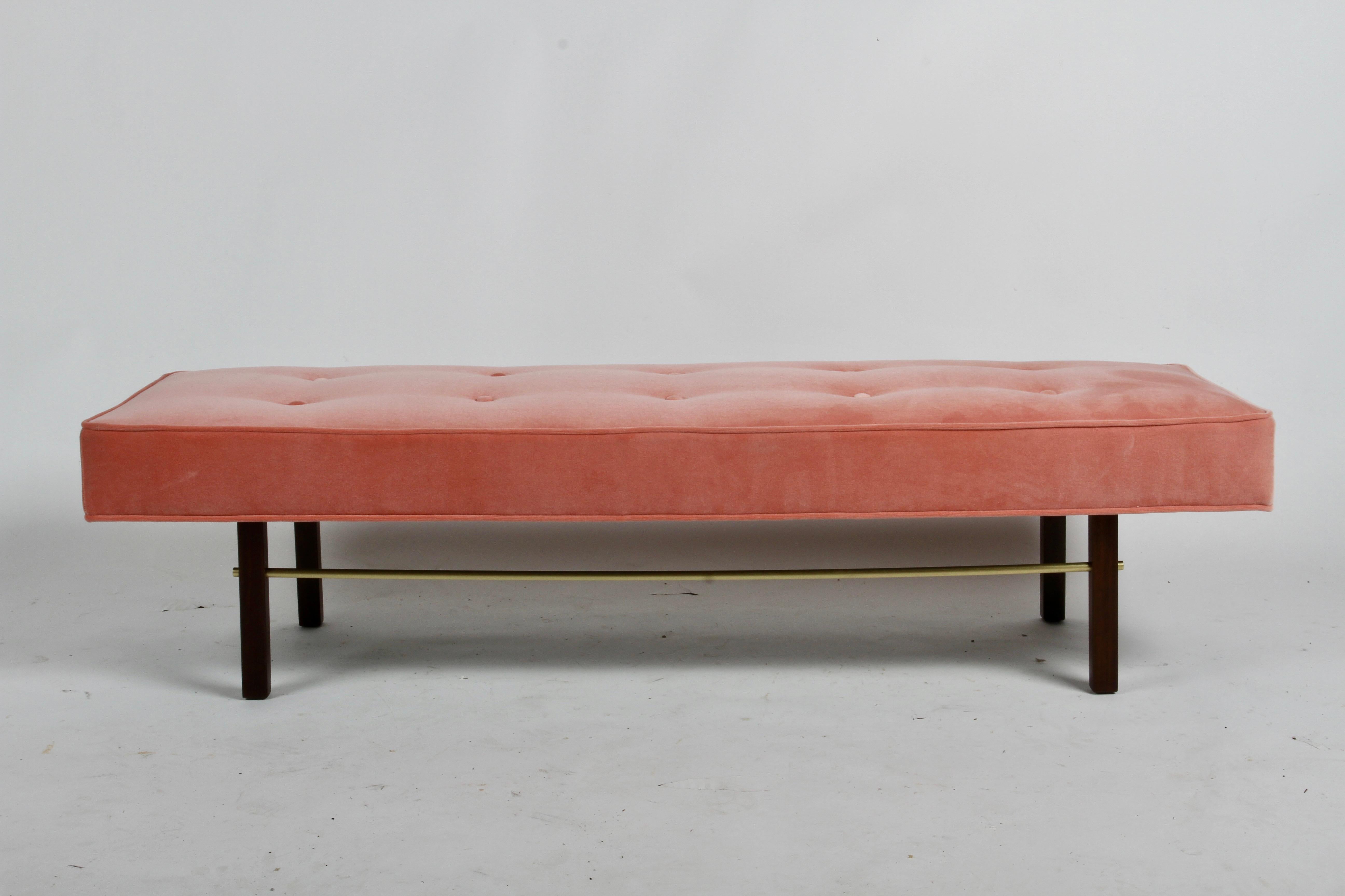Beautifully restored classic mid-century modern Milo Baughman for James Inc. 5 foot 5 Inch tufted bench, reupholstered in Holly Hunt Salmon colored Velvet with solid brass cross stretchers and on dark brown mahogany legs. Retain original label. New