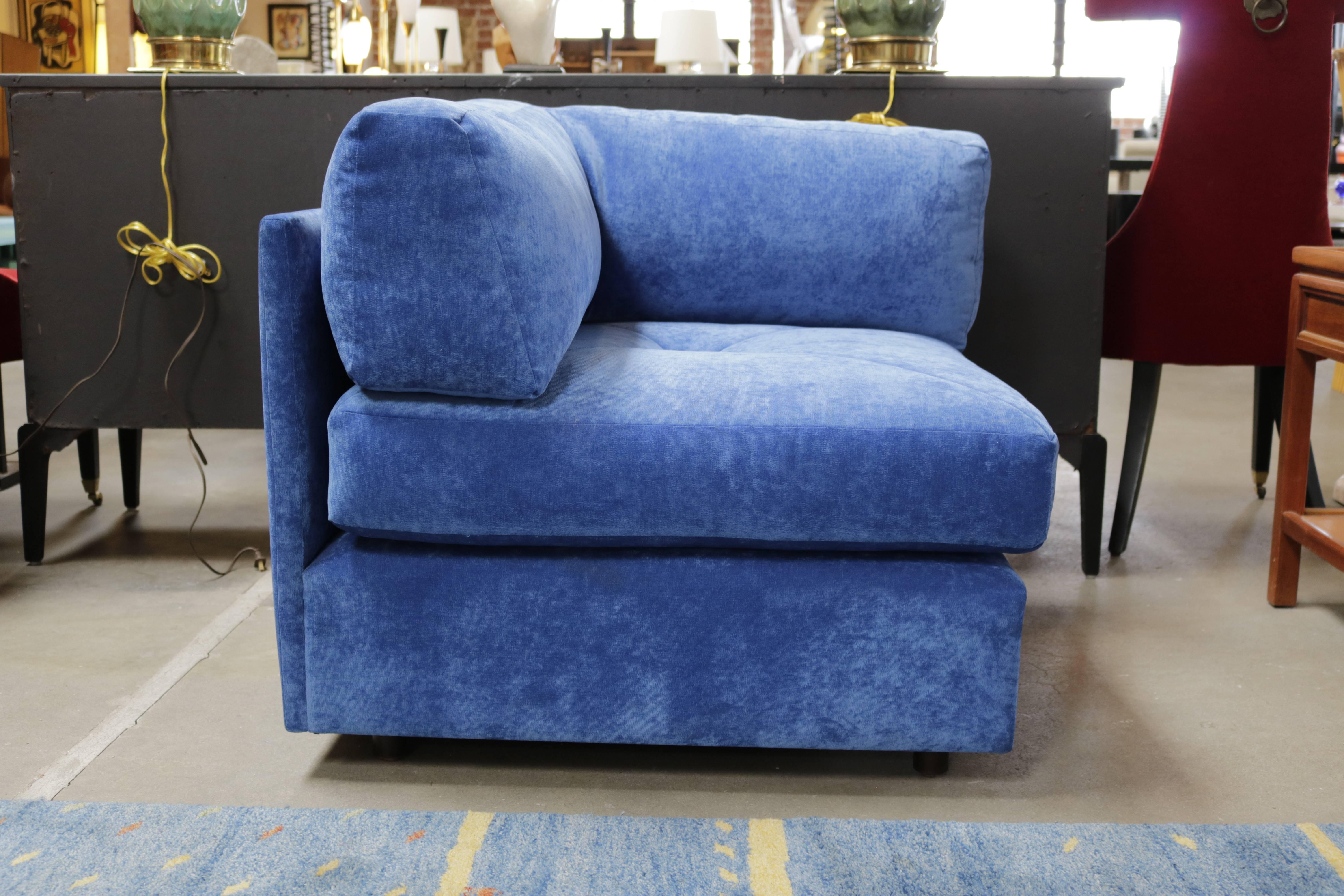 1960s two-piece lounge chair or settee by Milo Baughman, in beautiful blue velvet, on wheels. The ottoman conveniently opens up as storage.
Milo Baughman designed the Articulate collection for James, Inc. of North Carolina, Thayer Coggin's first