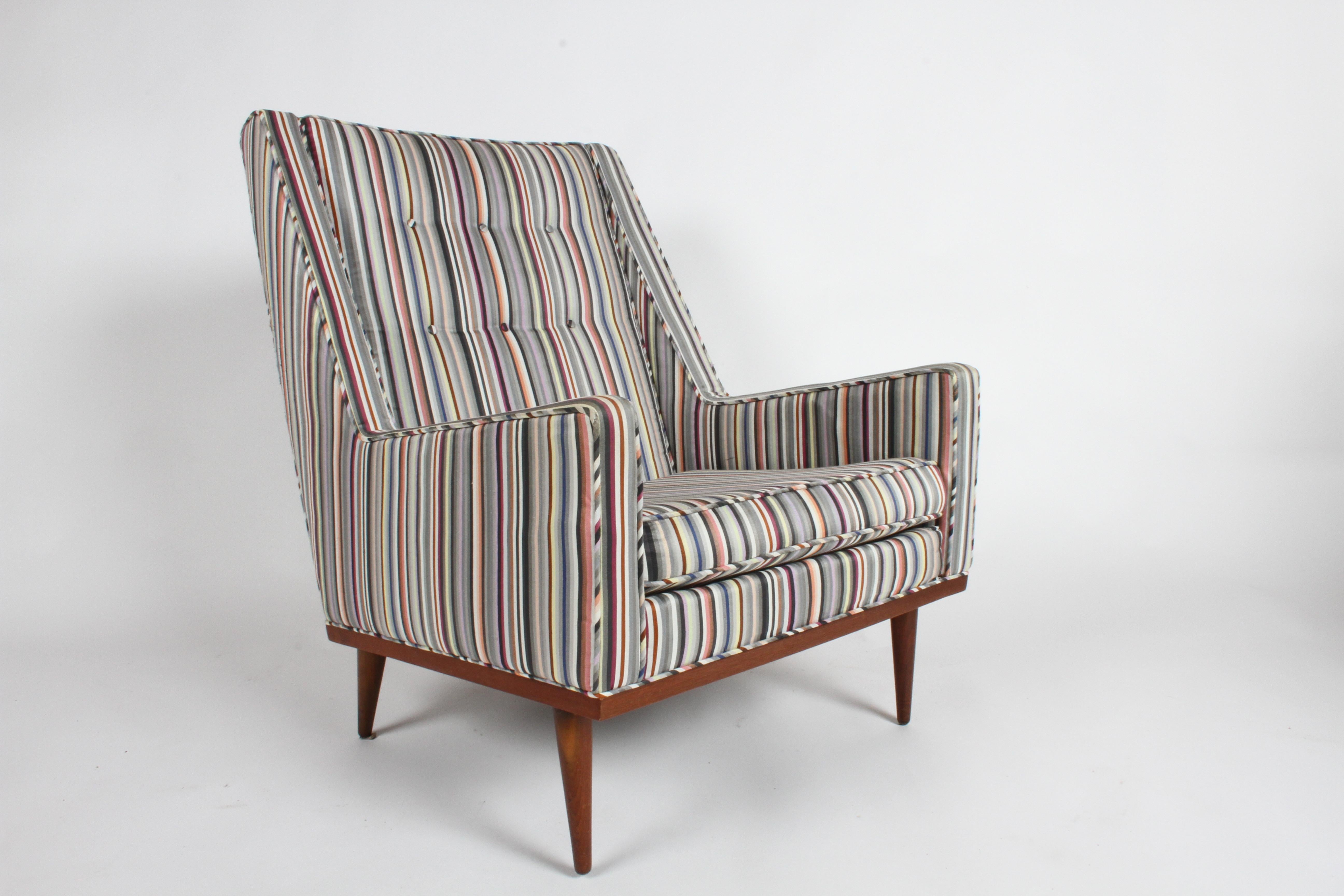 Milo Baughman for James Inc. King lounge chair, part of his articulate seating collection with Classic midcentury lines. This chair was reupholstered at some point in the last 10 years with a very handsome Paul Smith looking stripe upholstery,