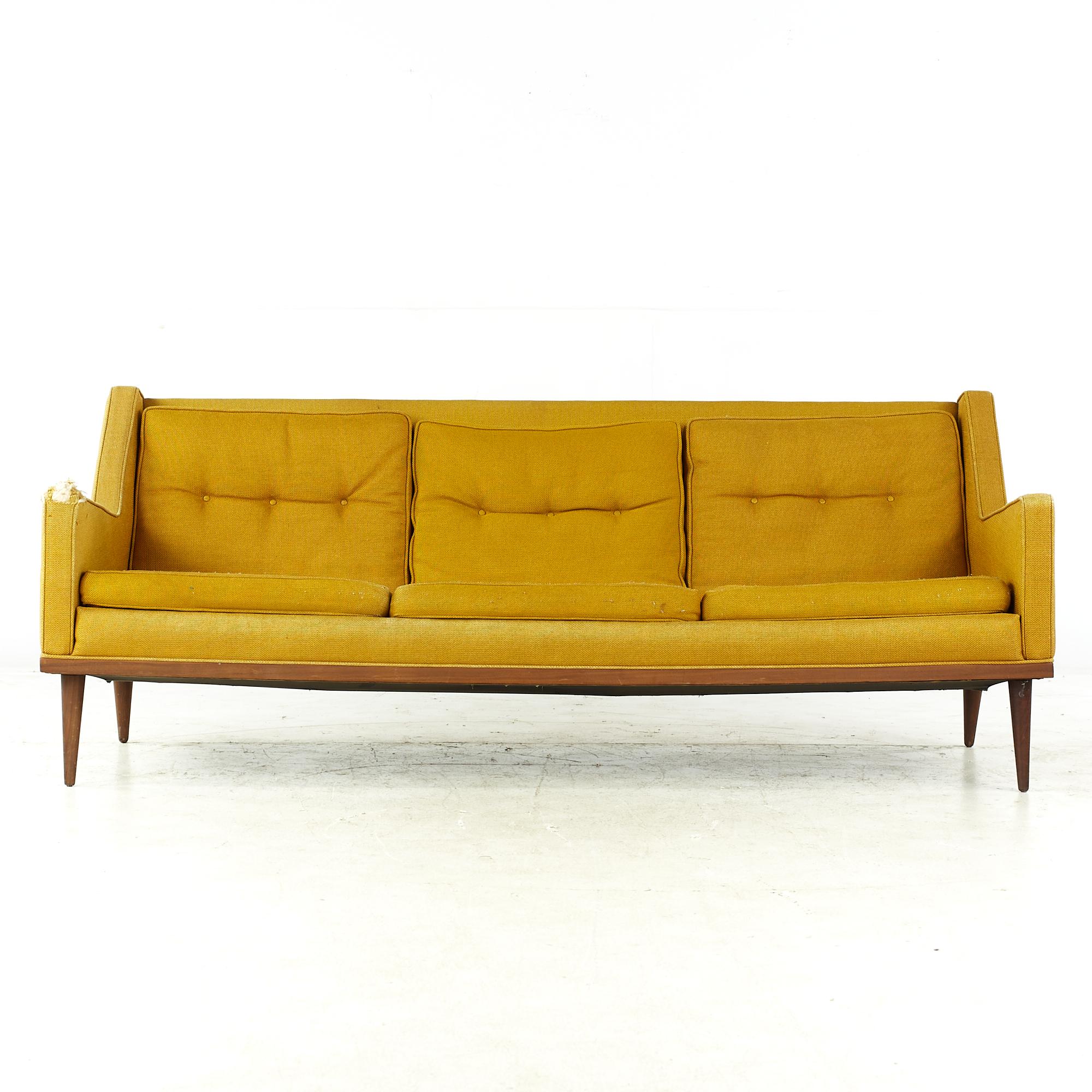 Milo Baughman for James Inc midcentury walnut sofa

This sofa measures: 70 wide x 31 deep x 28.5 inches high, with a seat height of 14.75 and arm height of 21 inches

All pieces of furniture can be had in what we call restored vintage condition.