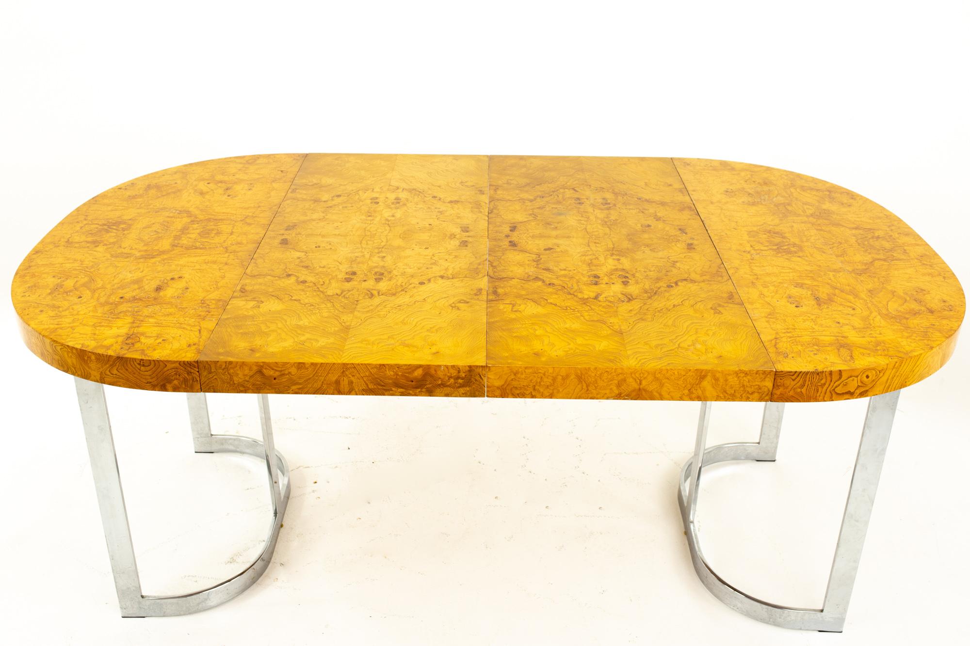 Milo Baughman Style midcentury burl wood and chrome dining table
Table with no leaves measures: 36 wide x 42 deep x 29.5 high 
Table with two leaves measures: 72 wide x 42 deep x 29.5 high 

All pieces of furniture can be had in what we call