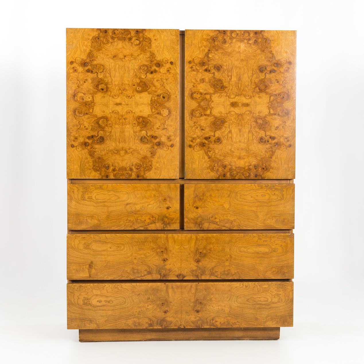 Milo Baughman for Lane Mid Century Burlwood Gentleman's Chest Highboy Dresser

This dresser measures: 42 wide x 18 deep x 58 inches high

All pieces of furniture can be had in what we call restored vintage condition. That means the piece is