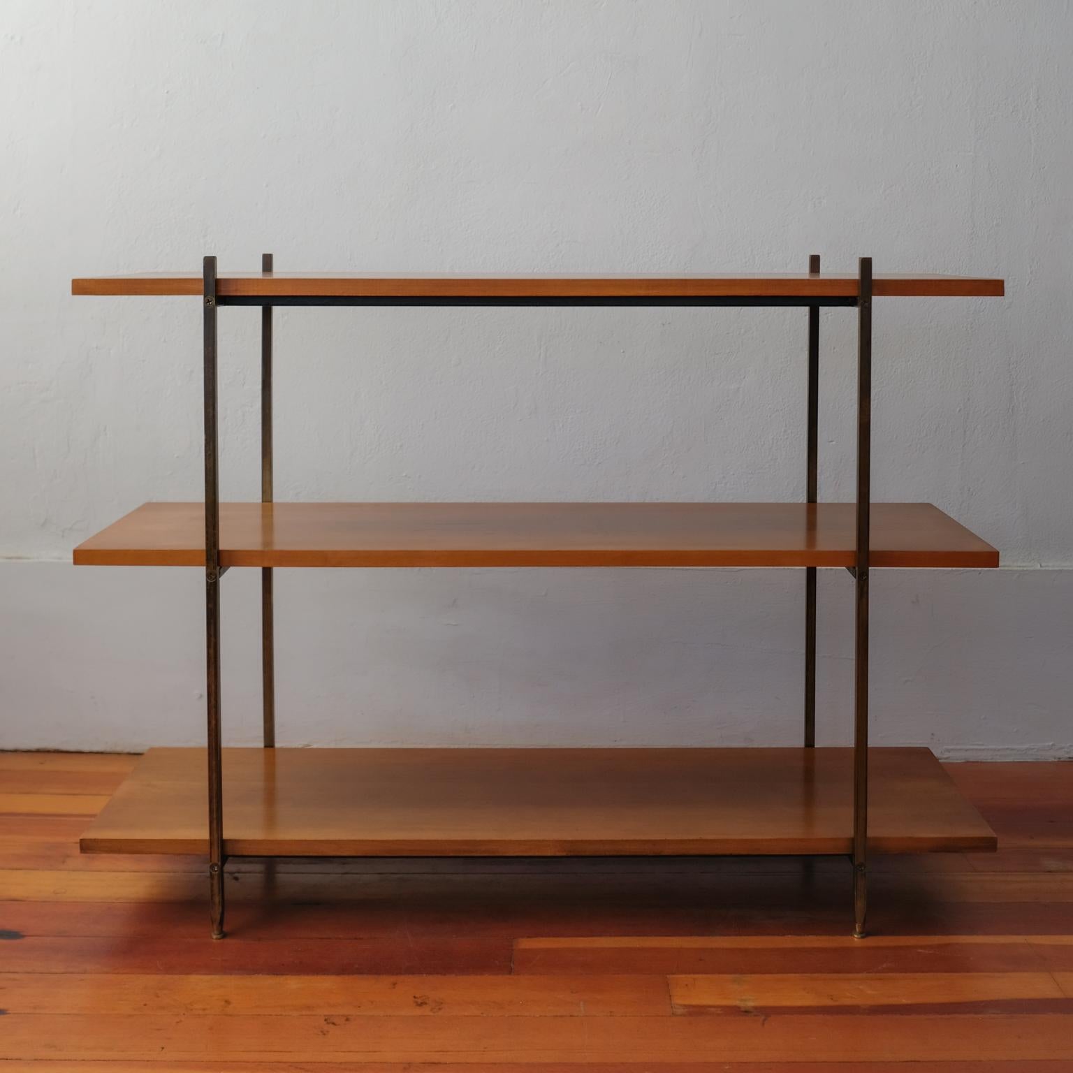 Milo Baughman for Murray Furniture shelf/room divider. Solid brass frame with adjustable feet for leveling. Solid wood shelves. Refined construction, high quality and heavy unit. In the 1954 Murray Furniture catalog it is called a 3-shelf room
