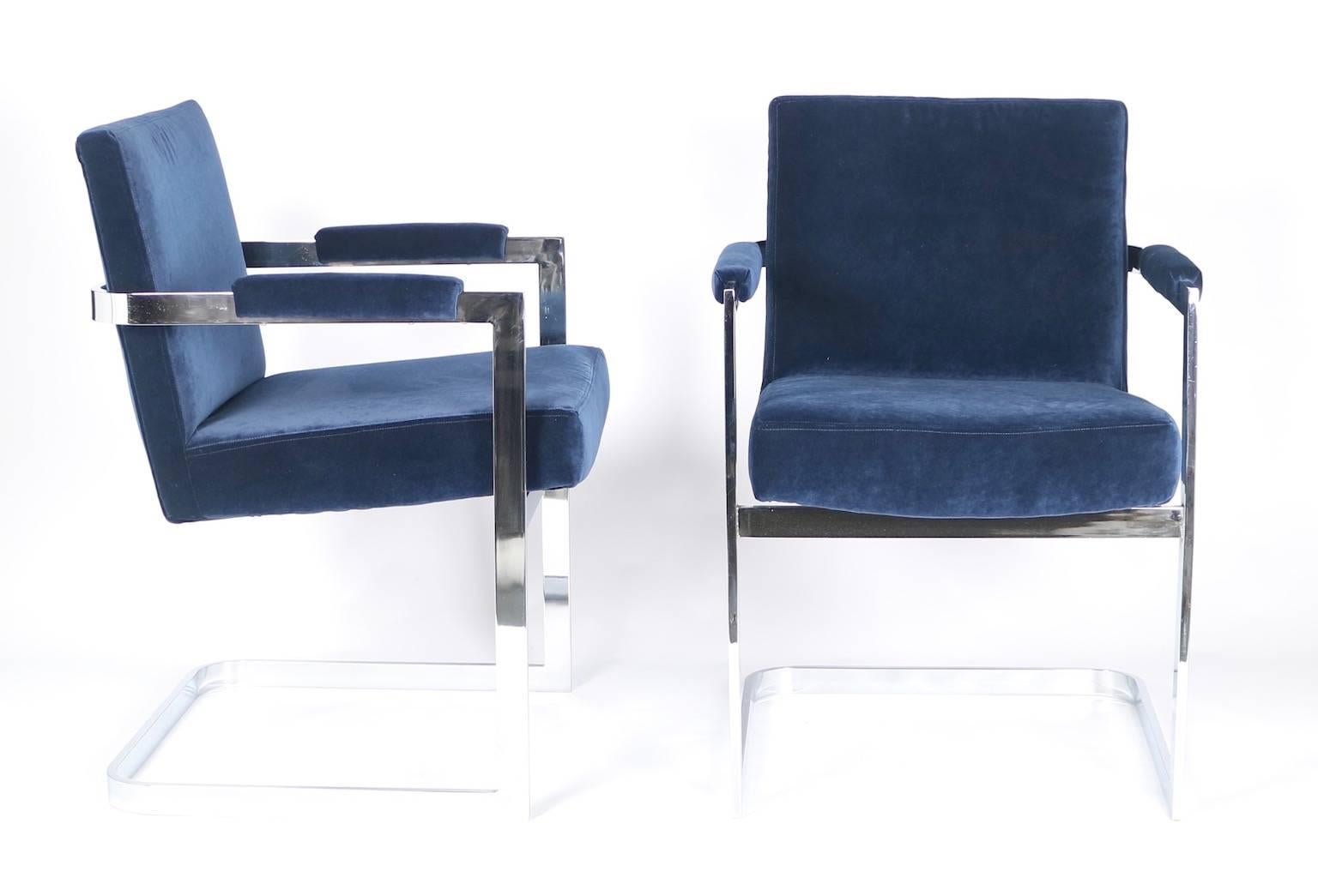 Mid-century modern Milo Baughman for Thayer Coggin armchairs in polished chrome and blue velvet. The velvet on these chairs looks new. These chairs are in very good vintage condition and have wear consistent with age and use.