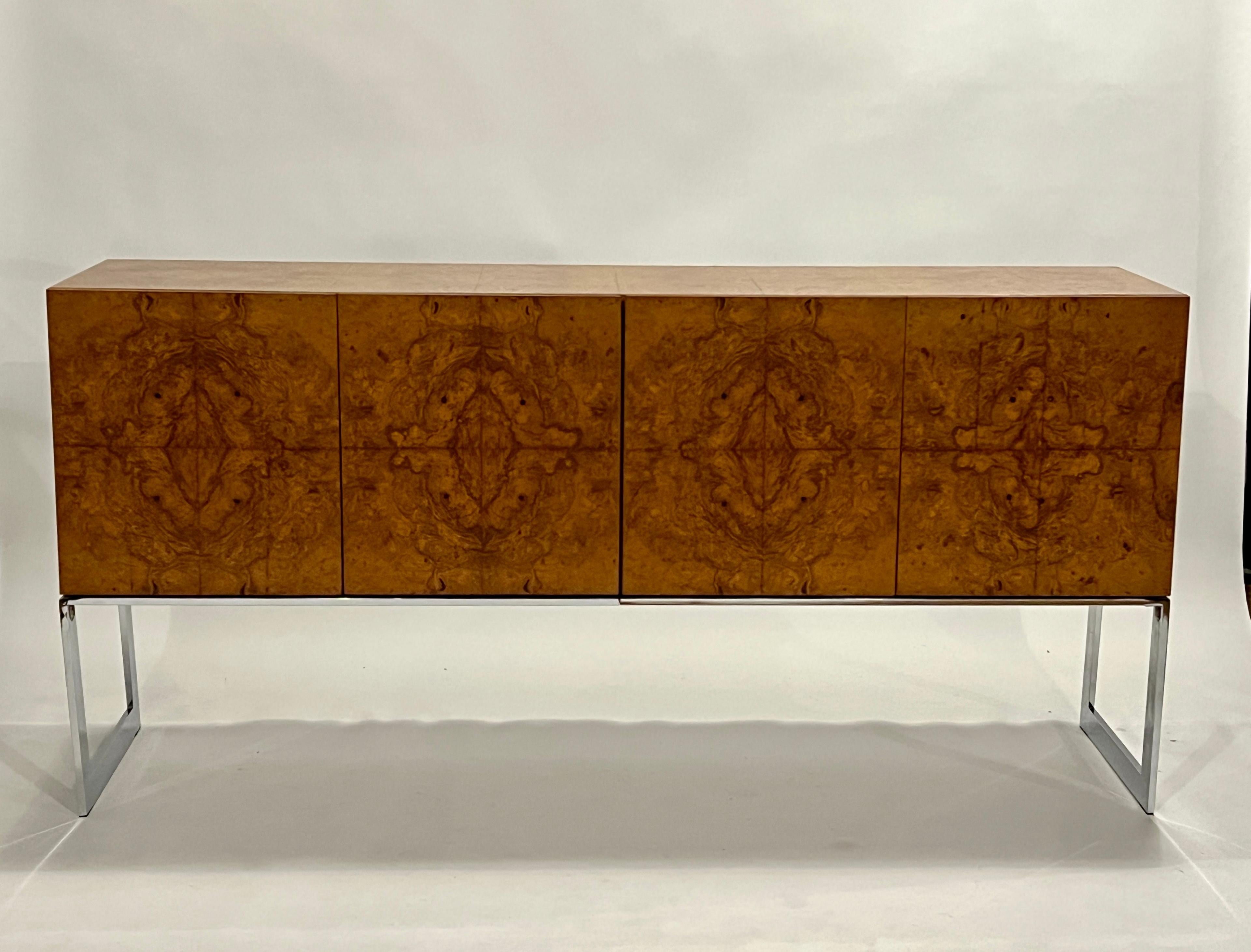 Milo Baughman for Thayer Coggin sideboard or credenza made from a beautiful book match walnut burl wood case on mirrored chrome frame, The interior has the original buffet opull out cutlery drawers with removable felt  lining and adjustable wood